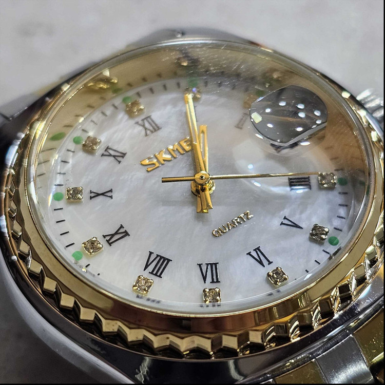 ست ساعت مچی عقربهای کوارتز زنانه و مردانه اسکمی مدل 90-98 کد 05