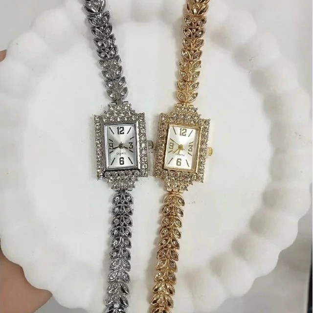 ساعت مچی زنانه مجلسی نگین دار بند فول نگین طلایی