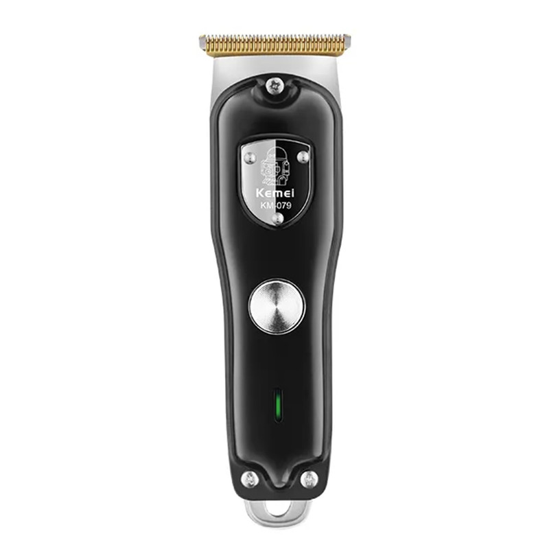 ماشین اصلاح موی صورت کیمی مدل KM-079 با تیغه کربن استیل، باتری 600 میلیآمپر، 4 شانه تنظیم طول 1 تا 4 میلیمتر، استفاده خشک و مرطوب و شارژدهی 100 دقیقه