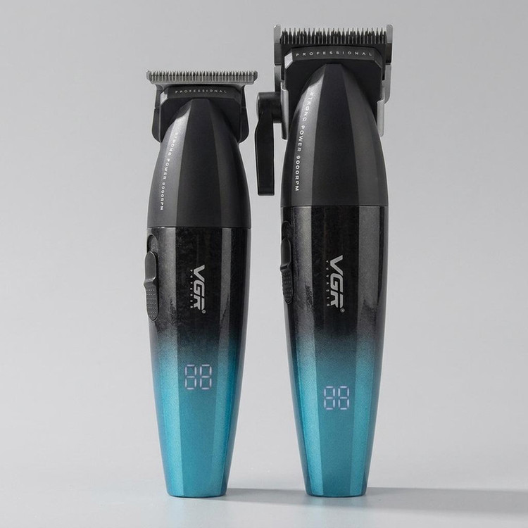 ماشین اصلاح موی سر و صورت شارژی وی جی ار مدل V-640 S2 با موتور 9000 دور در دقیقه، تیغه استیل پیشرفته خودتیزشونده، طراحی ارگونومیک، نمایشگر شارژ، قابلیت تنظیم سرعت، باتری 2000 میلیآمپر ساعت دو بسته 2 عددی