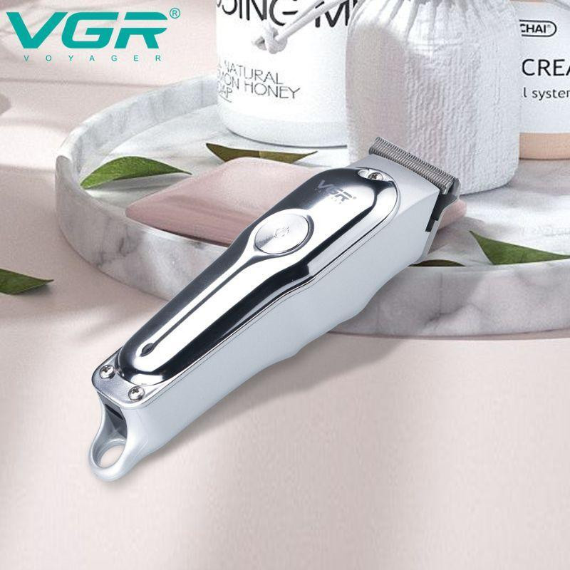 ماشین اصلاح موی صورت شارژی وی جی ار مدل 071 با تیغه استیل ضد زنگ، قابلیت تنظیم سرعت، منبع انرژی برق و باتری، همراه با 4 عدد شانه، مجموعه 2 عددی