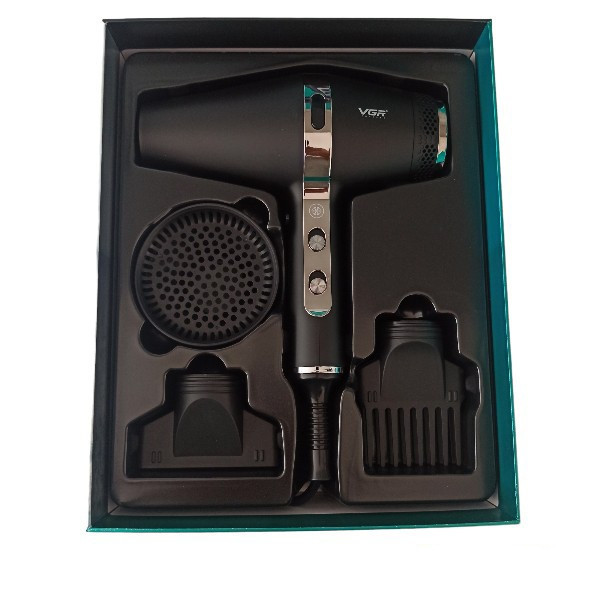 سشوار حرفهای 2200 وات وی جی ار مدل V-451، موتور AC، وزن 1200 گرم، المنت سرامیک تورمالین، دارای سری دیسپانسر، متمرکزکننده پهن، سری شانهدار با ویژگی فرکنندگی، صافکنندگی، حجمدهندگی، با قابلیت عملکرد توربو، خشککردن سریع