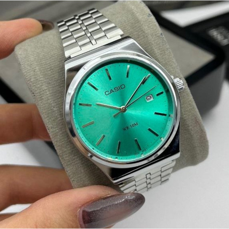 ساعت مچی مردانه کاسیوCASIO وینتیج بند نقره ای صفحه نمایش گرد رنگ بندی کد 9023