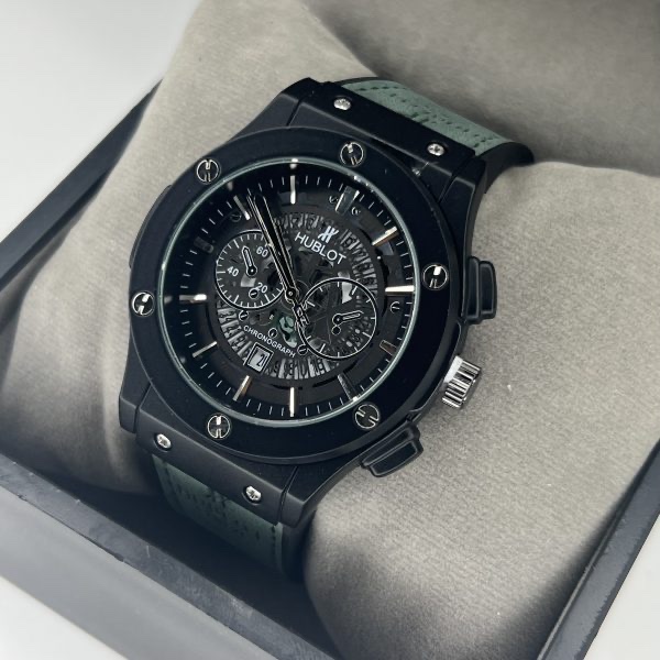 ساعت مردانه HUBLOT بند چرمی قاب فلزی