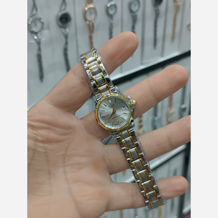 ساعت زنانه و دخترانه کاسیو casio بند استیل نقره ای طلایی تقویم دار