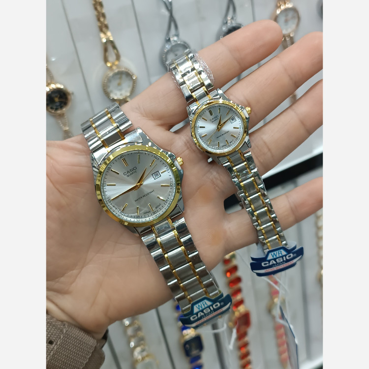 ساعت زنانه و دخترانه کاسیو casio بند استیل نقره ای طلایی تقویم دار