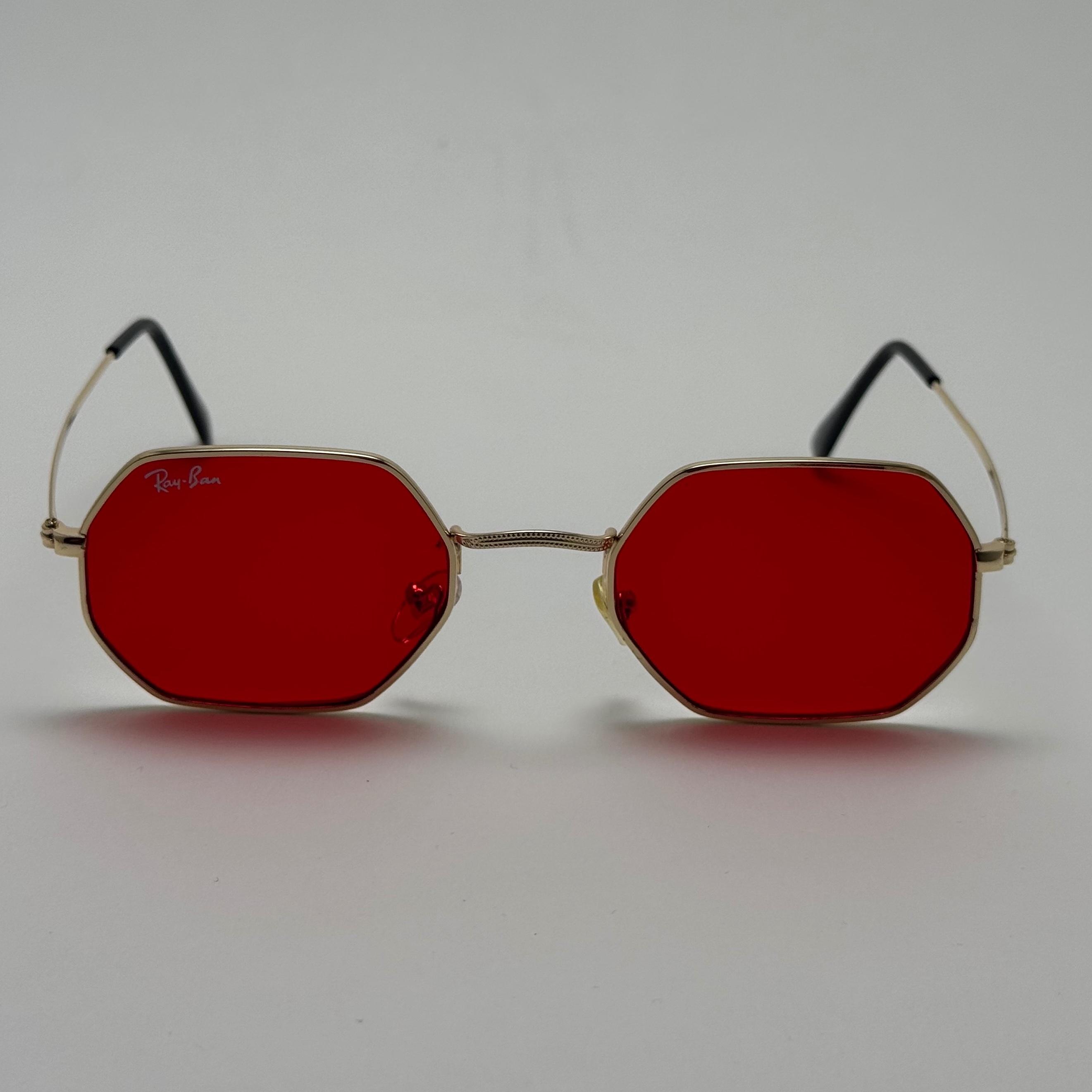 عینک شب ریبن Ray-ban قرمز فریم طلایی کد RB 3556