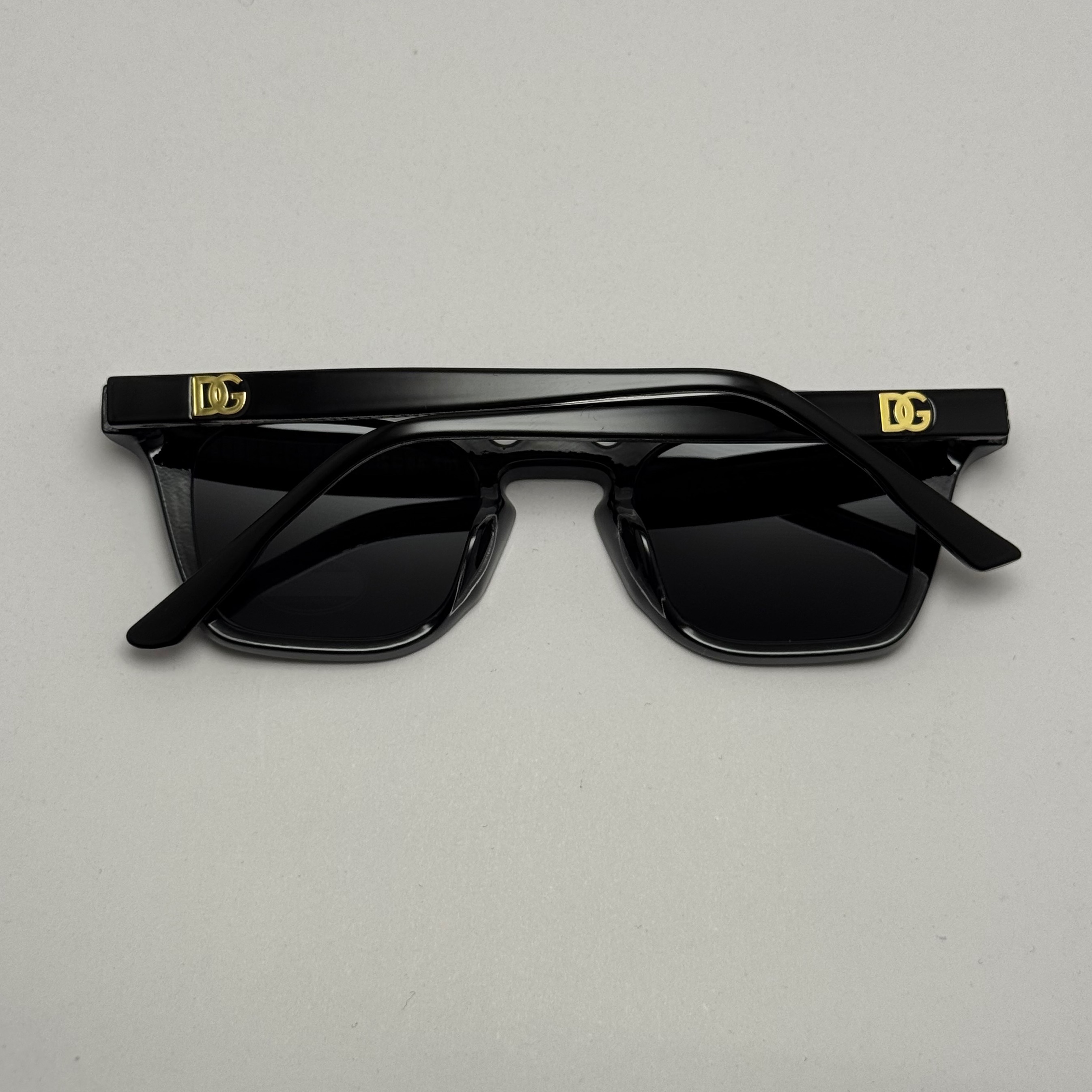 عینک آفتابی پلاریزه دولچه گابانا DOLCE GABBANA دسته سیم کشی شده لولا فنر مشکی کد 7707