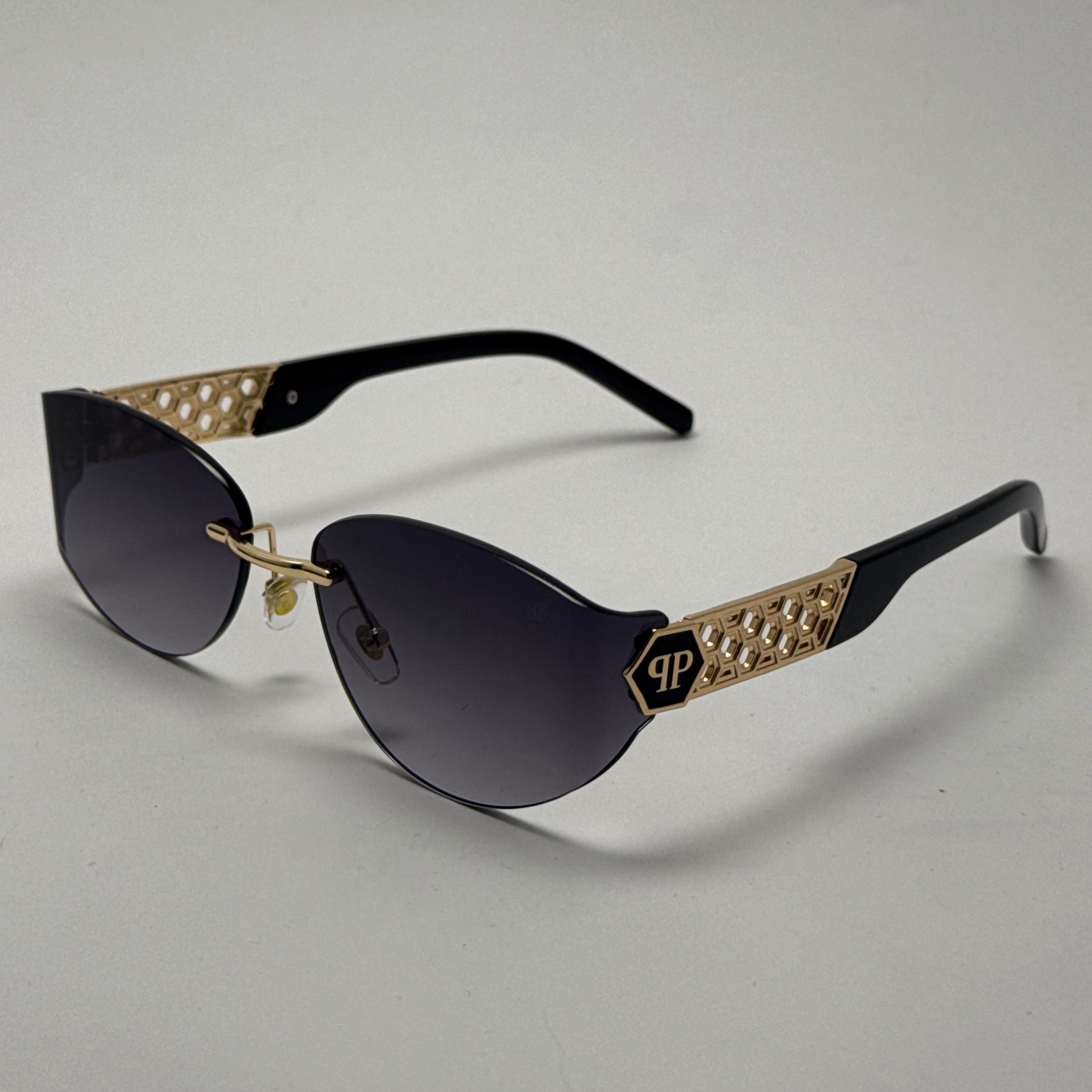 عینک آفتابی فیلیپ پلین Philip Plein مدل Luxury Shield فریم لس مشکی طلایی - لنز UV400