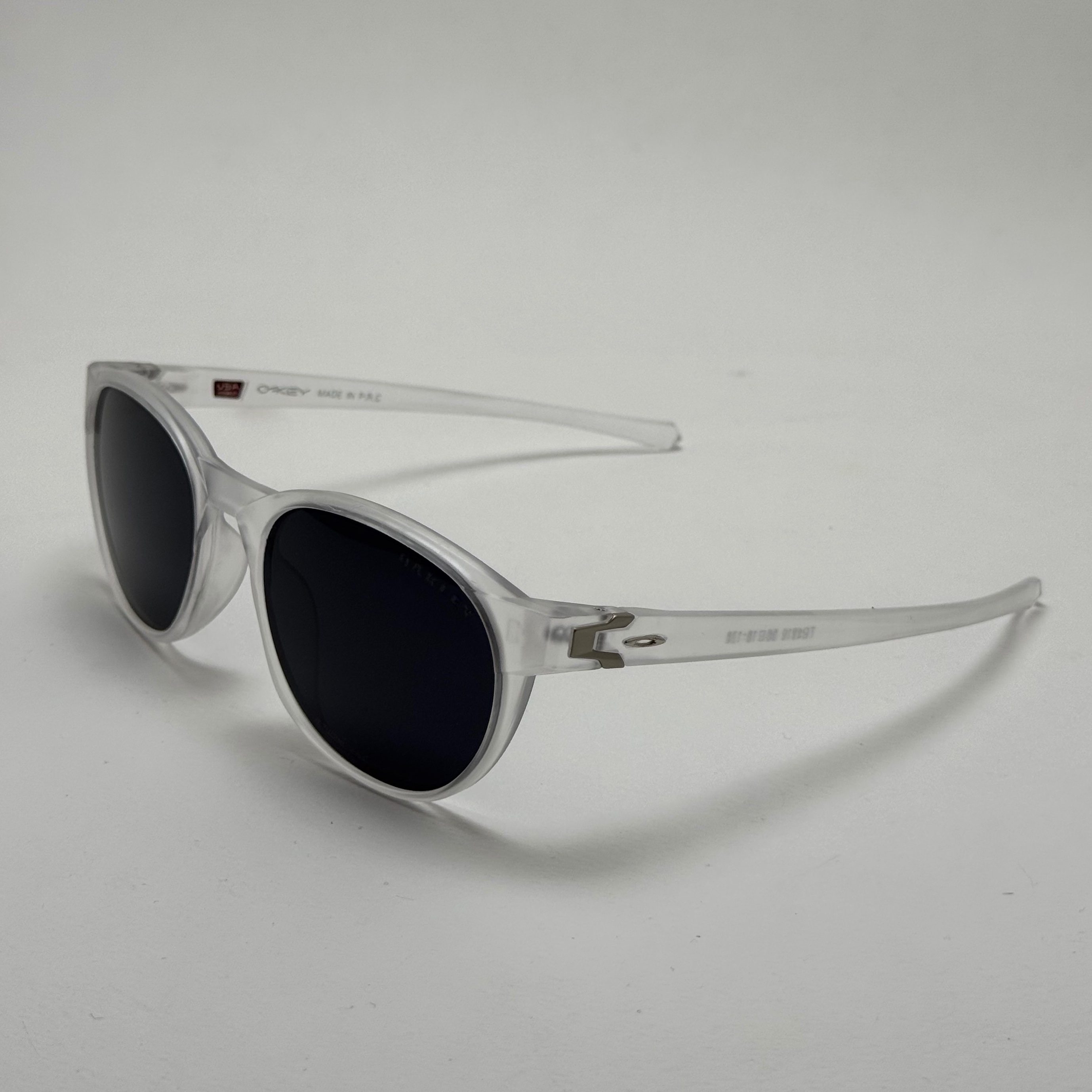 عینک آفتابی پلاریزه اوکلی Oakley فریم کریستالی عدسی مشکی گرد کد TO4910