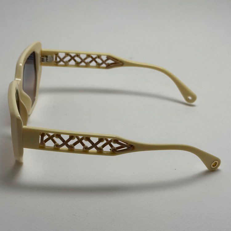 عینک آفتابی زنانه هرمس مدل Hermes Cut Out دسته چرمی کرمی کد رفرنس 1178