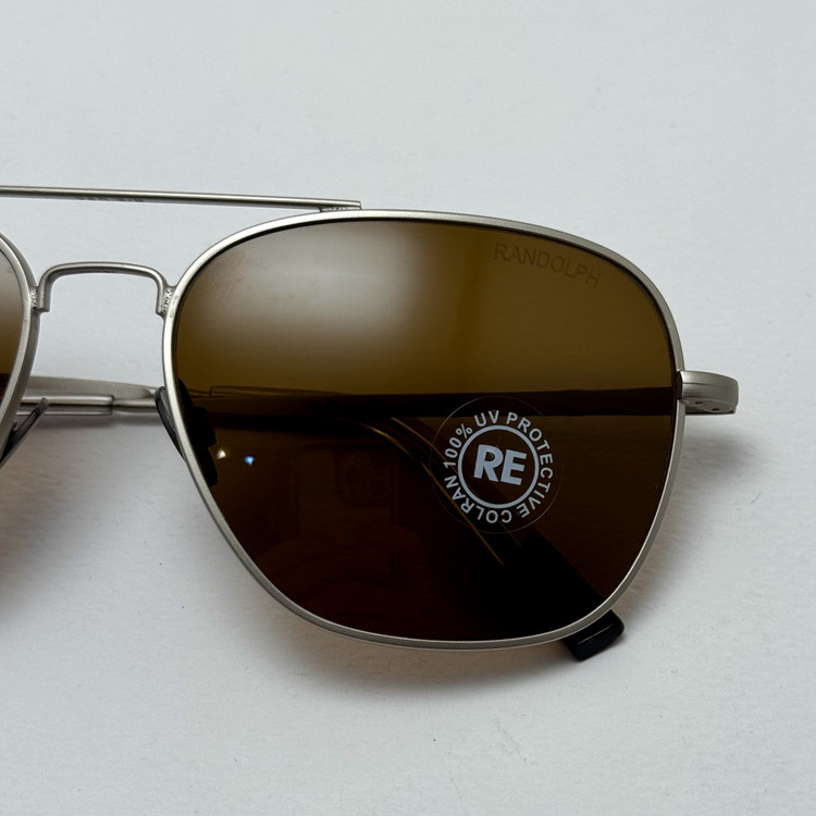 عینک آفتابی خلبانی رندولف شیشه سنگ آنتی رفلکس قهوه ای فریم نقره ای فول پک RANDOLPH AVIATOR RE 58 24K White GOLD