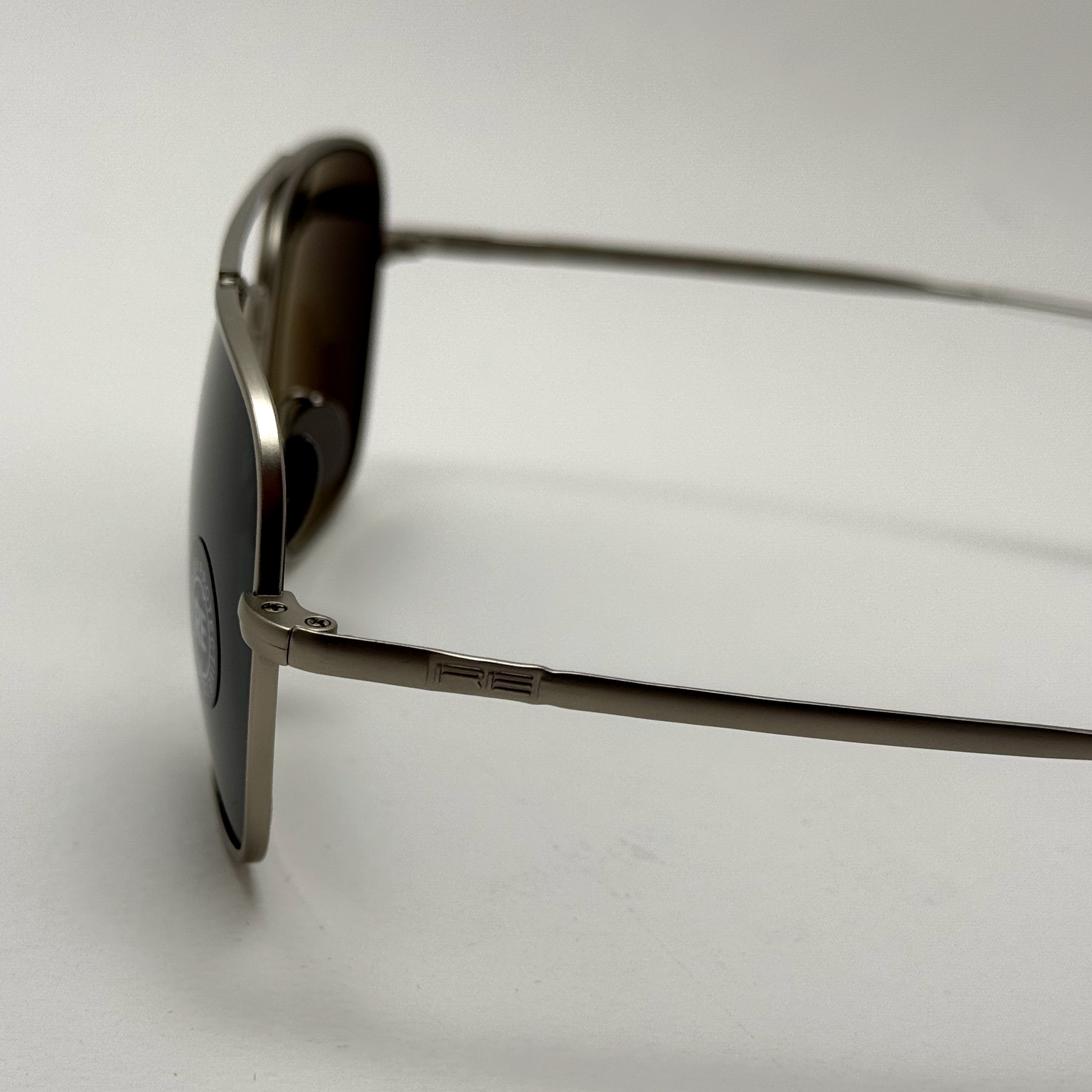 عینک آفتابی خلبانی رندولف شیشه سنگ آنتی رفلکس مشکی نقره ای فول پک RANDOLPH AVIATOR RE 58 24K WHITE GOLD