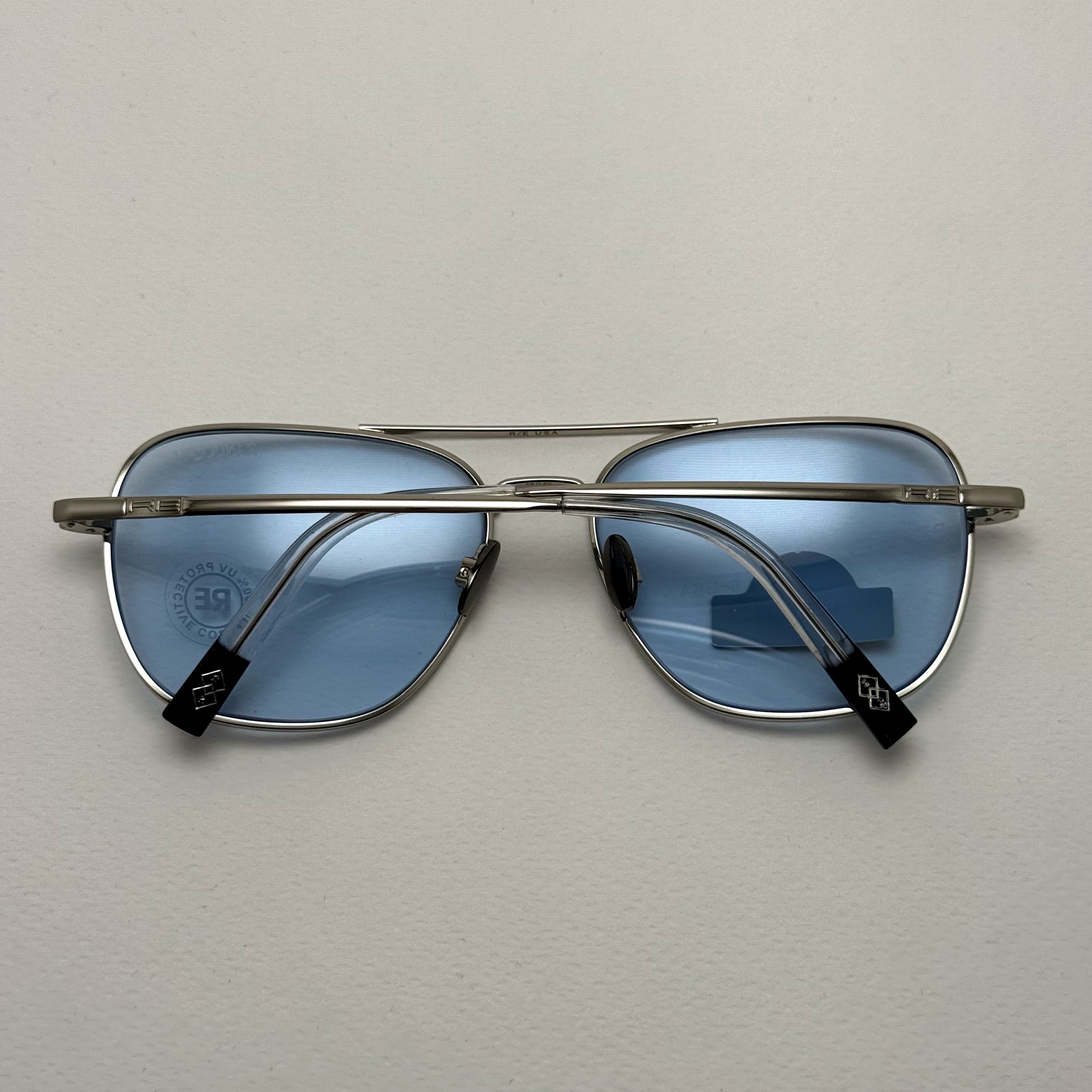 عینک شب و آفتابی خلبانی رندولف شیشه سنگ آبی آسمانی نقره ای فول پک RANDOLPH AVIATOR RE 58 24K WHITE GOLD