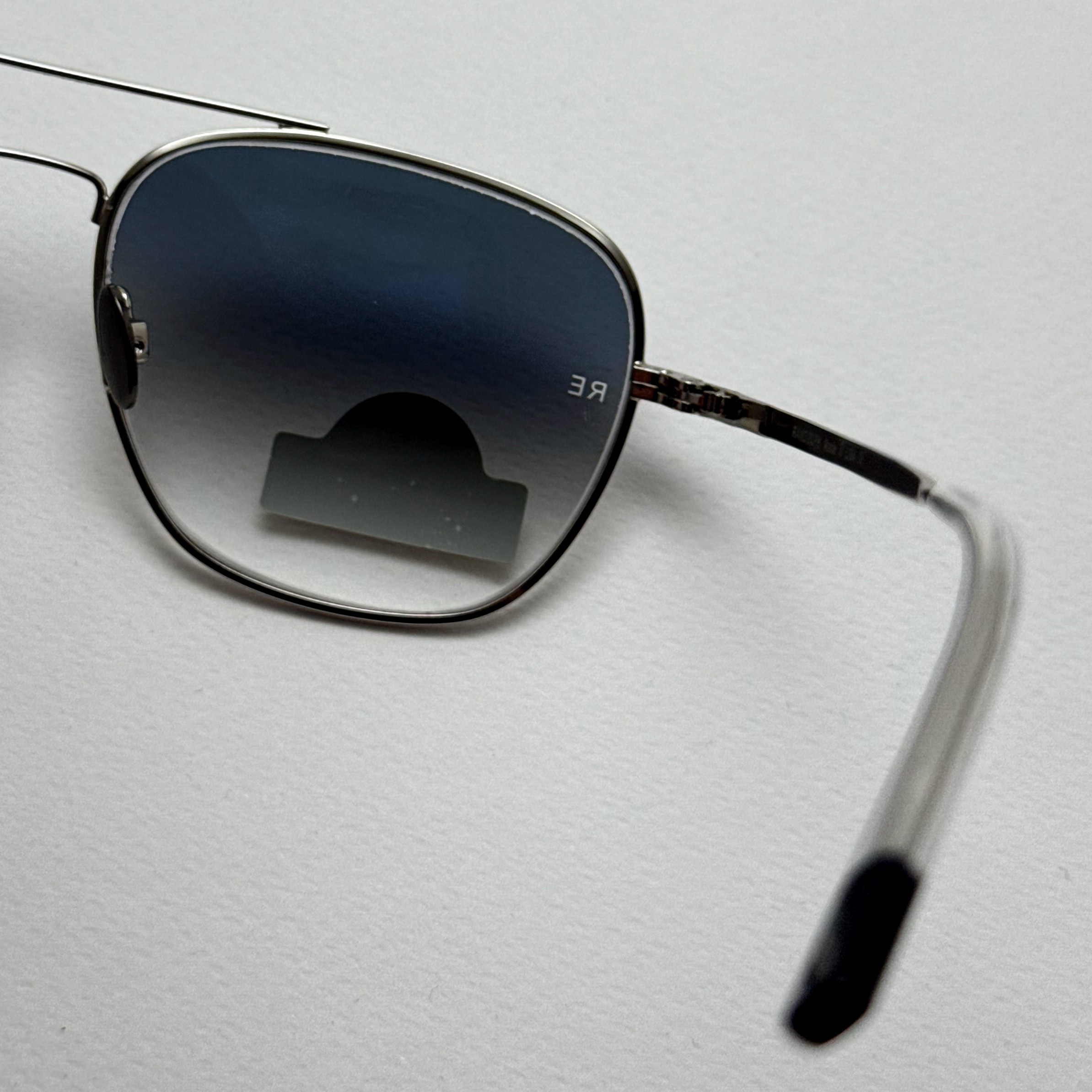 عینک آفتابی خلبانی رندولف شیشه سنگ آنتی رفلکس آبی هایلایت نقره ای فول پک RANDOLPH AVIATOR RE 58 24K WHITE GOLD
