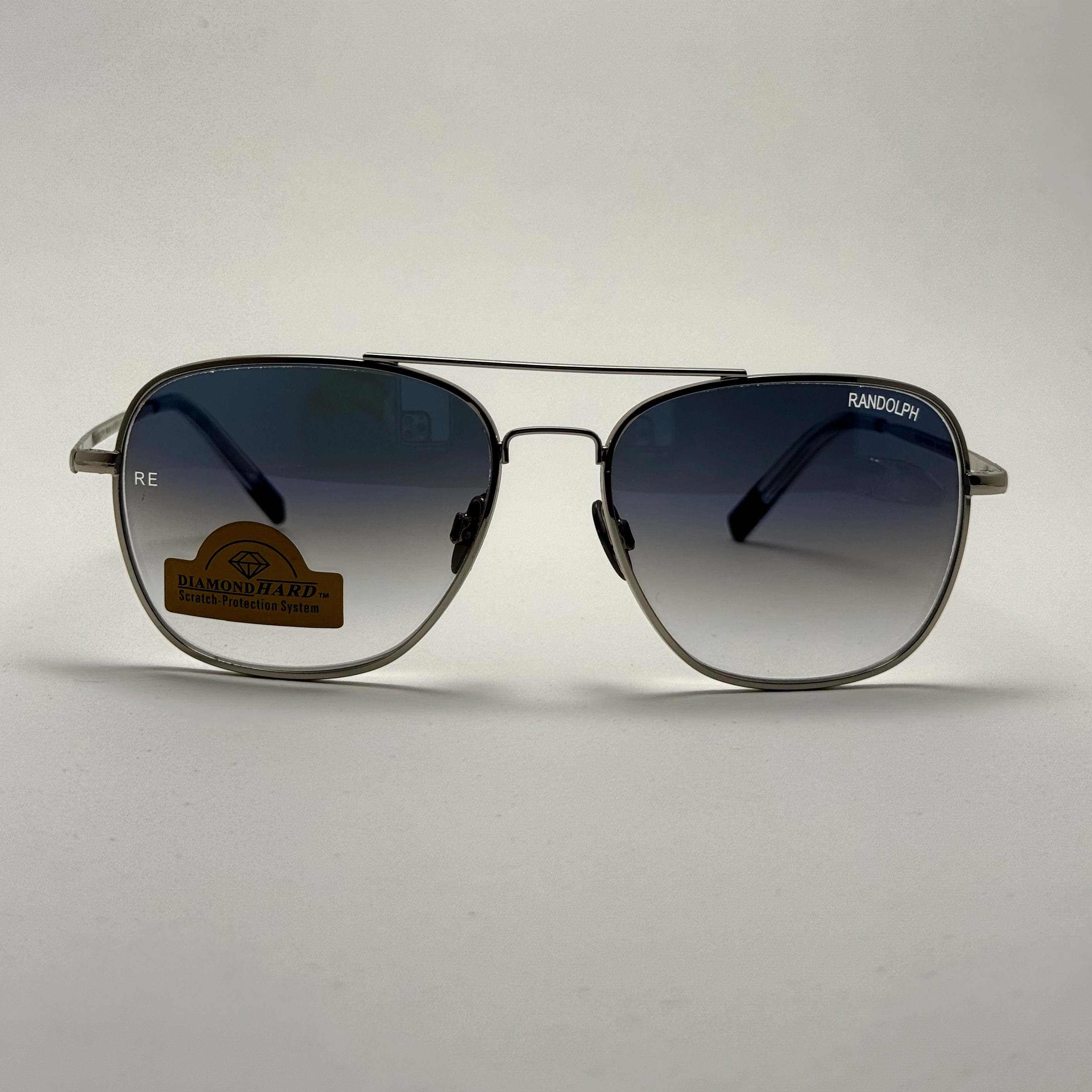 عینک آفتابی خلبانی رندولف شیشه سنگ آنتی رفلکس آبی هایلایت نقره ای فول پک RANDOLPH AVIATOR RE 58 24K WHITE GOLD