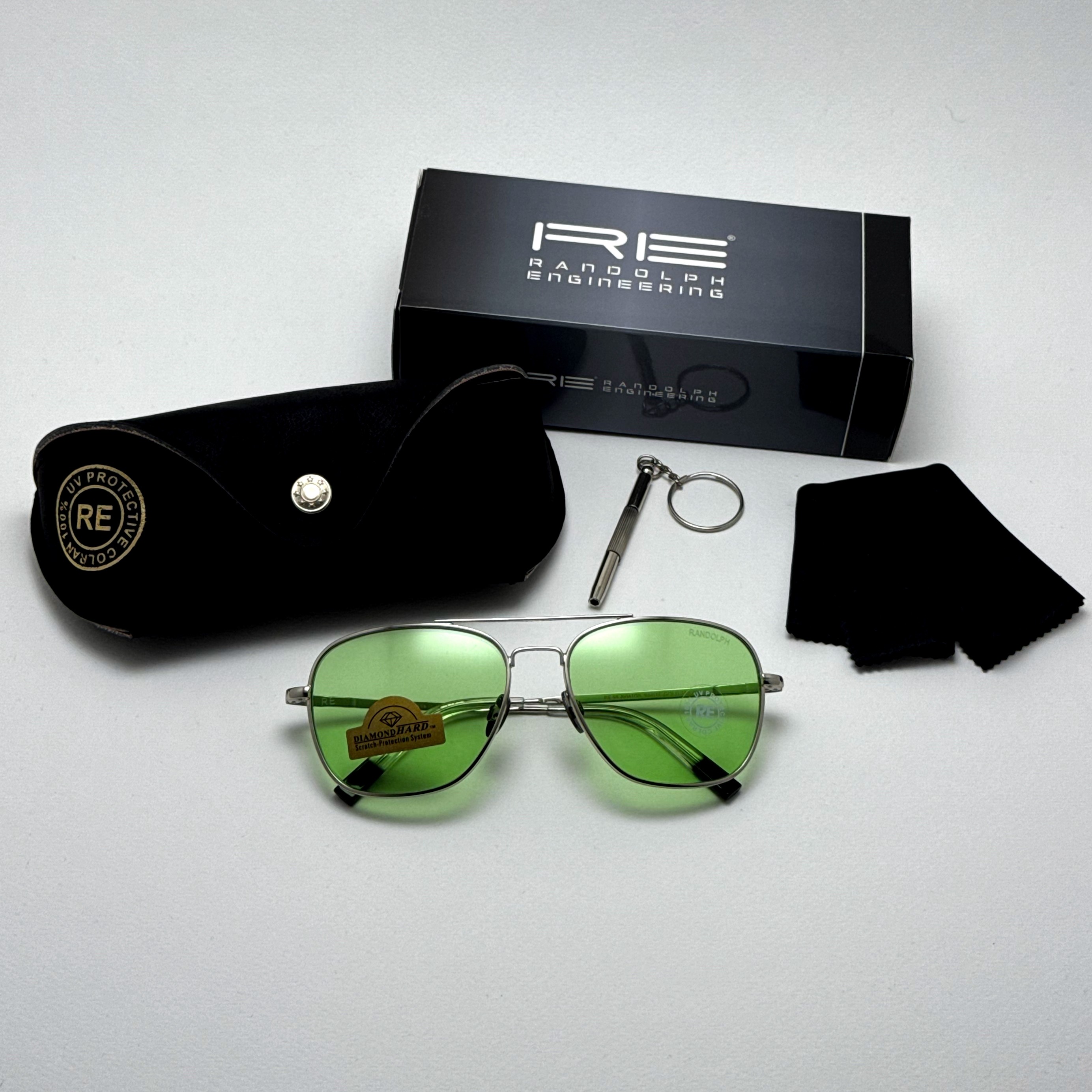 عینک آفتابی و شب خلبانی رندولف شیشه سنگ سبز فریم نقره ای فول پک اصلی RANDOLPH AVIATOR  RE 58 24K GOLD