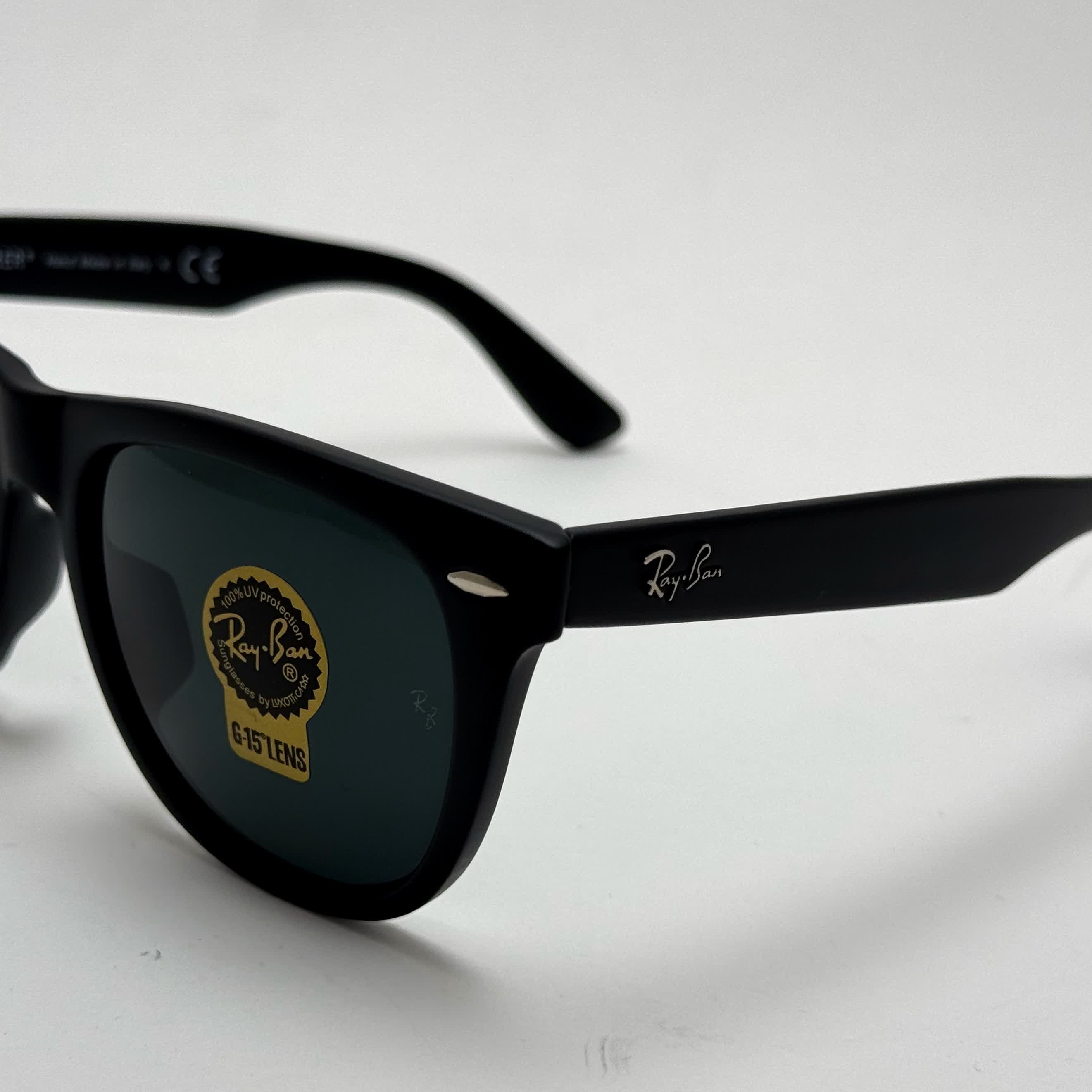عینک آفتابی ریبن ویفرر شیشه سنگ مشکی که همراه پک کامل ریبن Rayban WAYFARER RB 2140 سایز 54