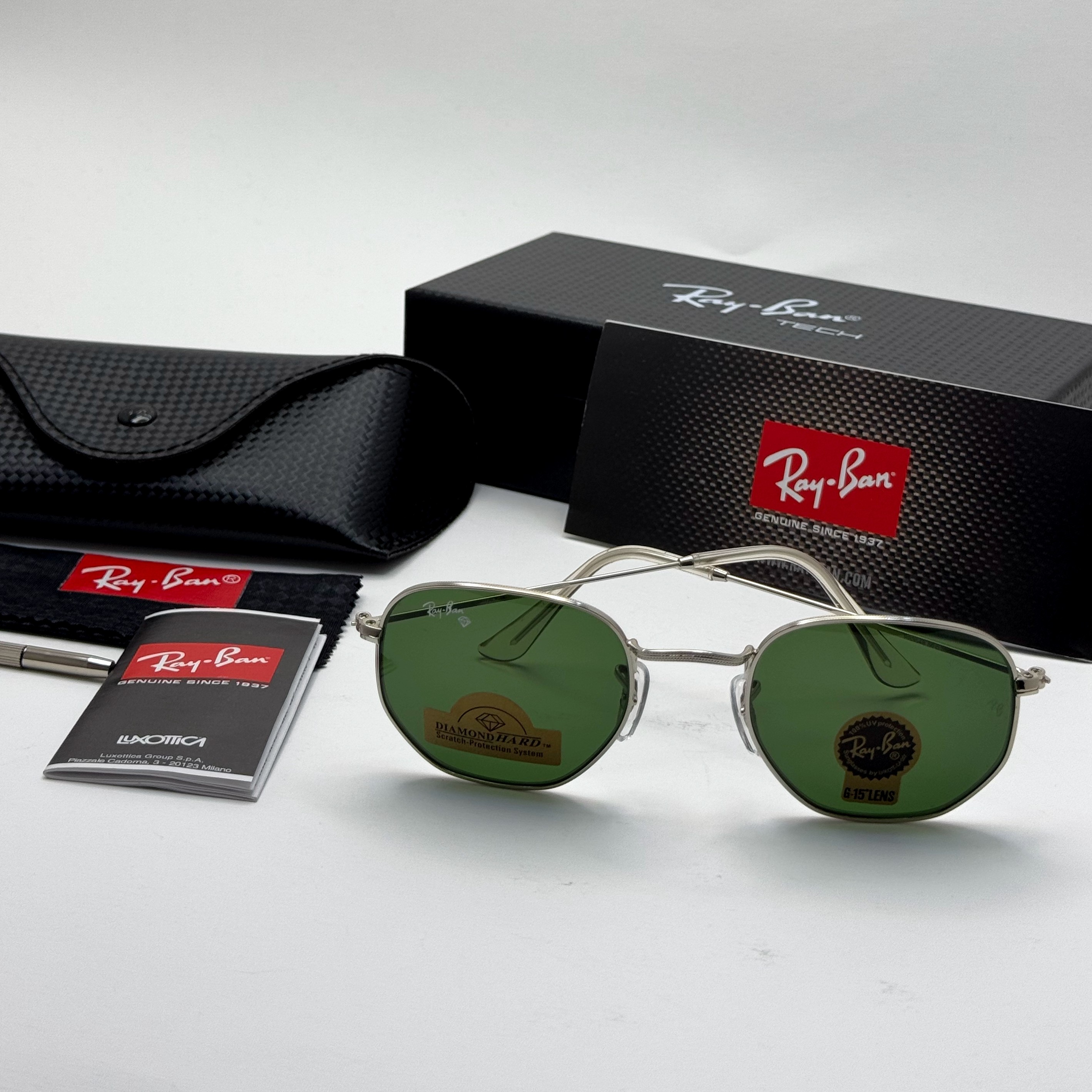 عینک ریبن هگزونال شیشه سنگ سبز فریم نقره ای به همراه پک کامل ریبن کد Rayban RB 3548