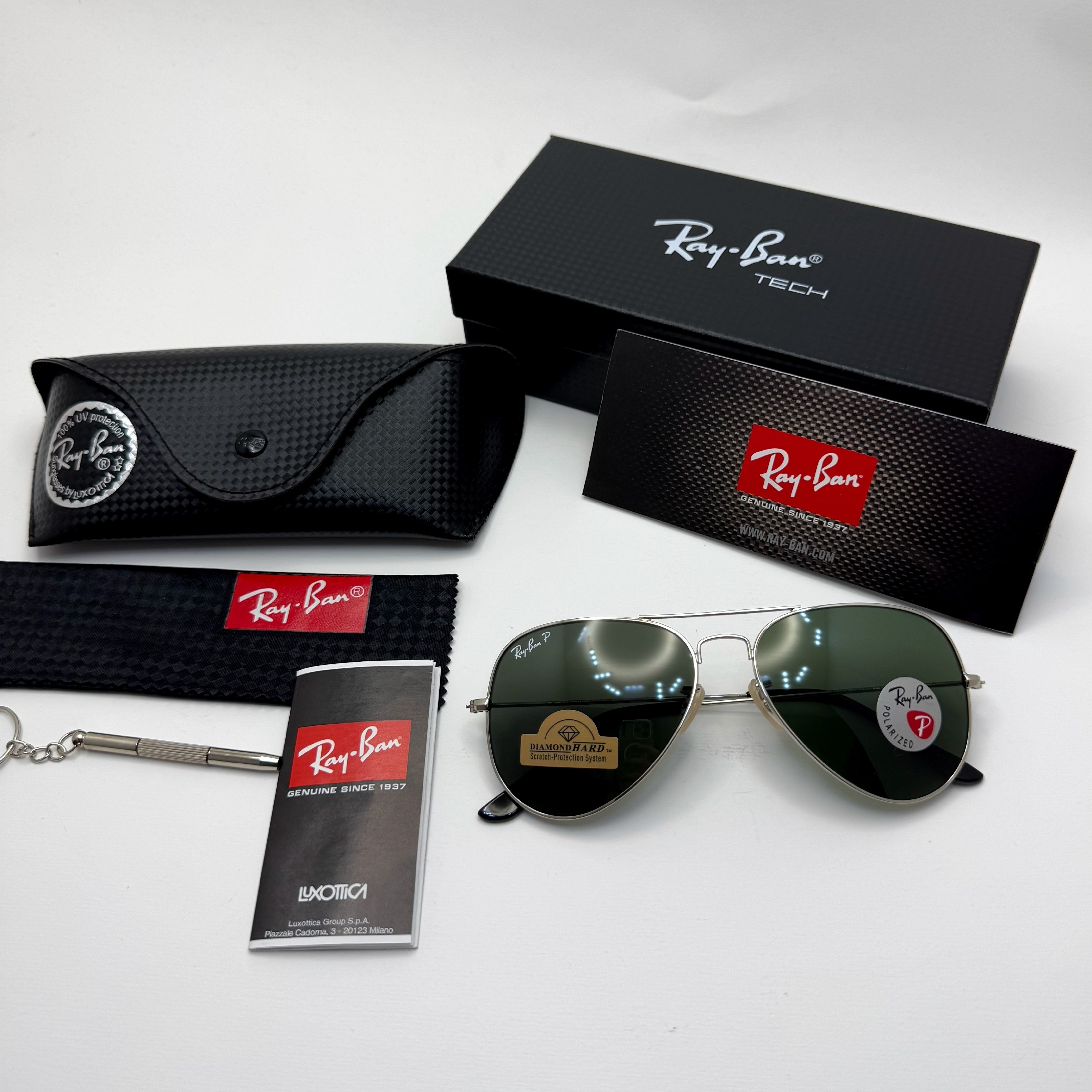 عینک ریبن خلبانی شیشه سنگ پلاریزه سبز با فریم نقره ای به همراه پک کامل ریبن کد Rayban RB 3026