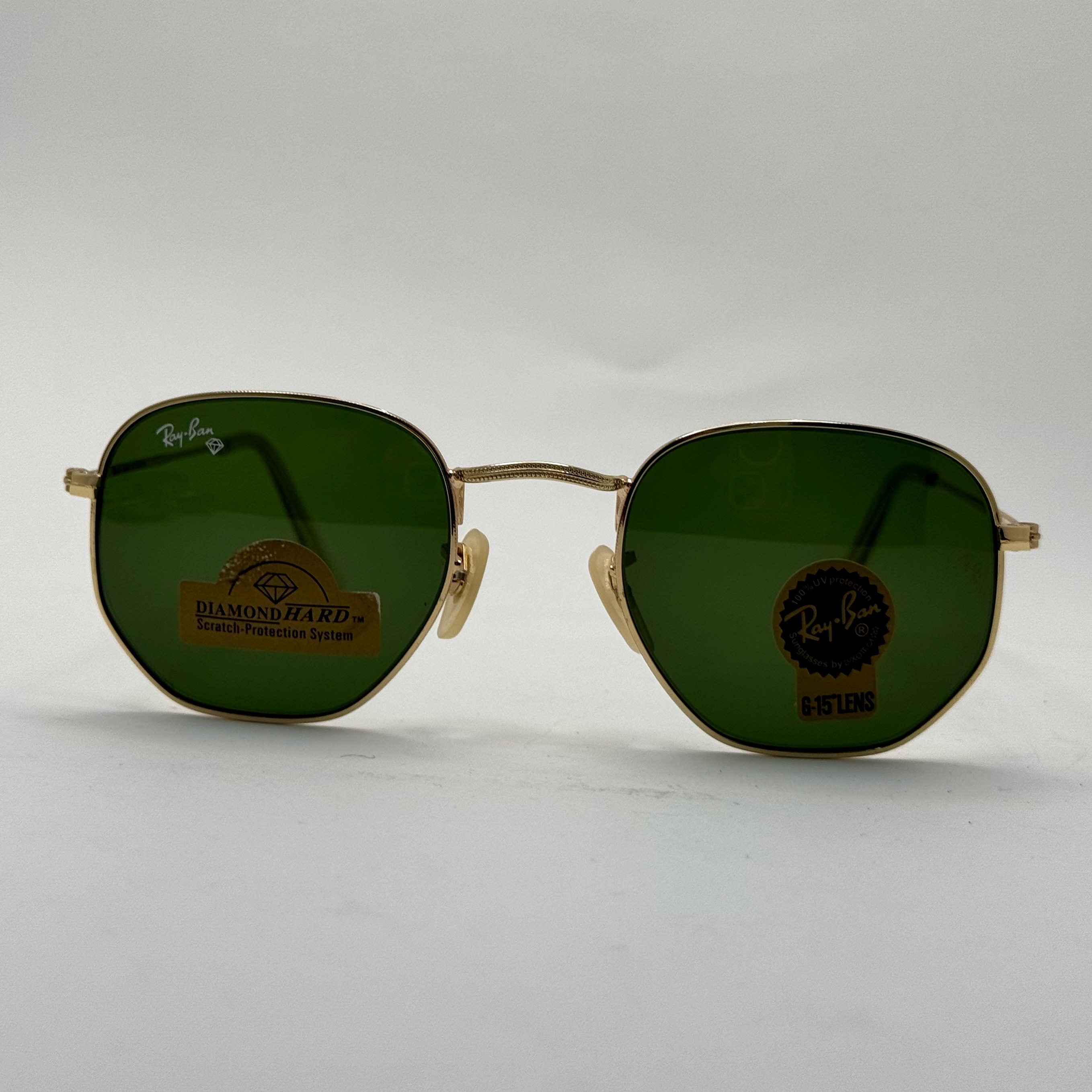 عینک ریبن هگزونال شیشه سنگ سیز فریم طلایی به همراه پک کامل ریبن کد Rayban RB 3548