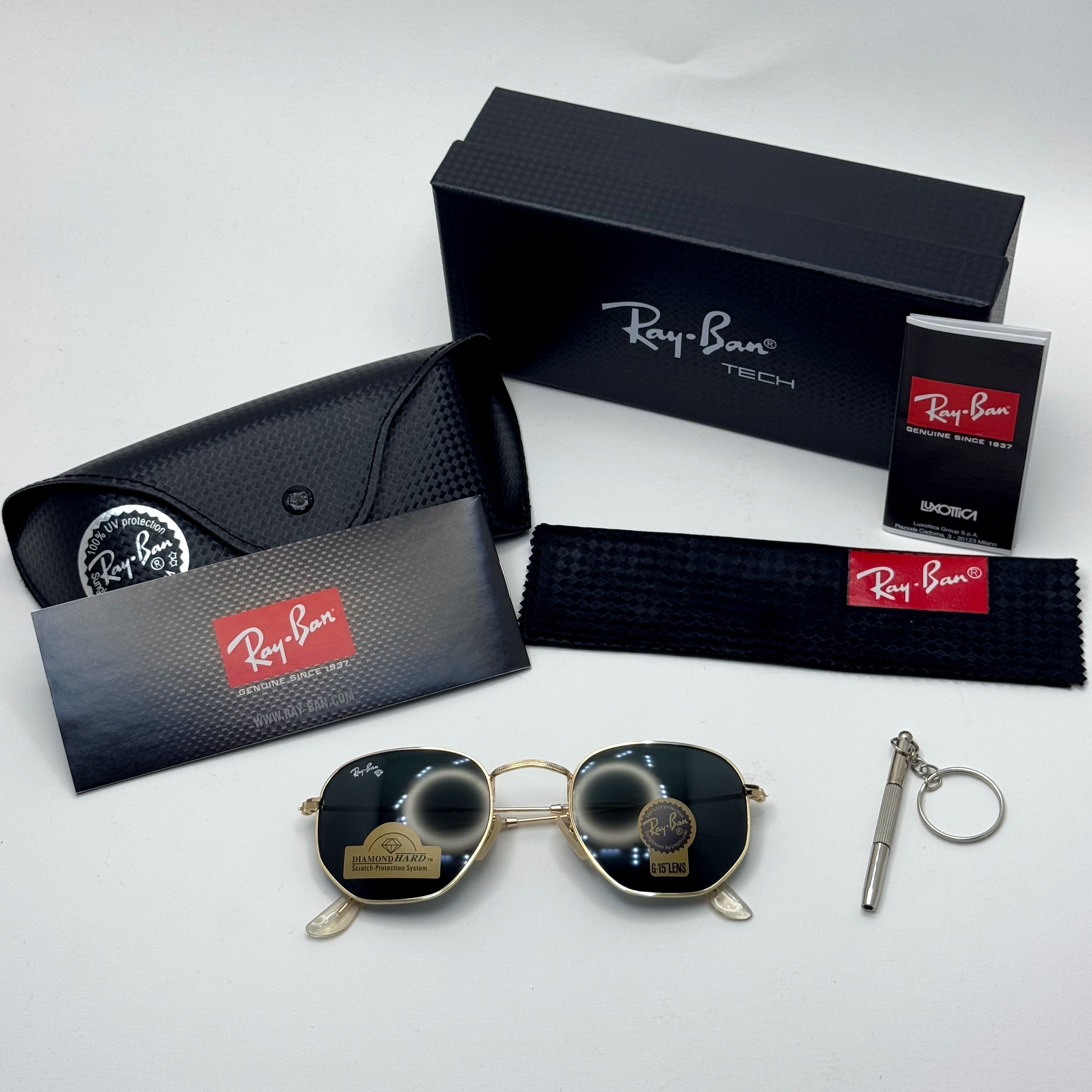 عینک ریبن هگزونال شیشه سنگ مشکی فریم طلایی به همراه پک کامل ریبن کد Rayban RB 3548