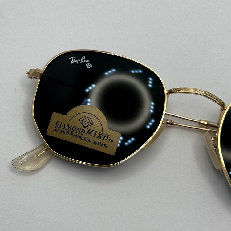 عینک ریبن هگزونال شیشه سنگ مشکی فریم طلایی به همراه پک کامل ریبن کد Rayban RB 3548