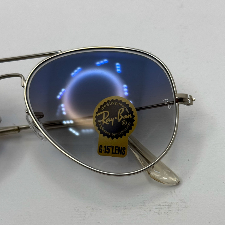 عینک ریبن خلبانی شیشه سنگ آبی هایلایت فریم نقره ای به همراه پک کامل ریبن Rayban RB 3025