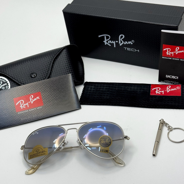 عینک ریبن خلبانی شیشه سنگ آبی هایلایت فریم نقره ای به همراه پک کامل ریبن Rayban RB 3025