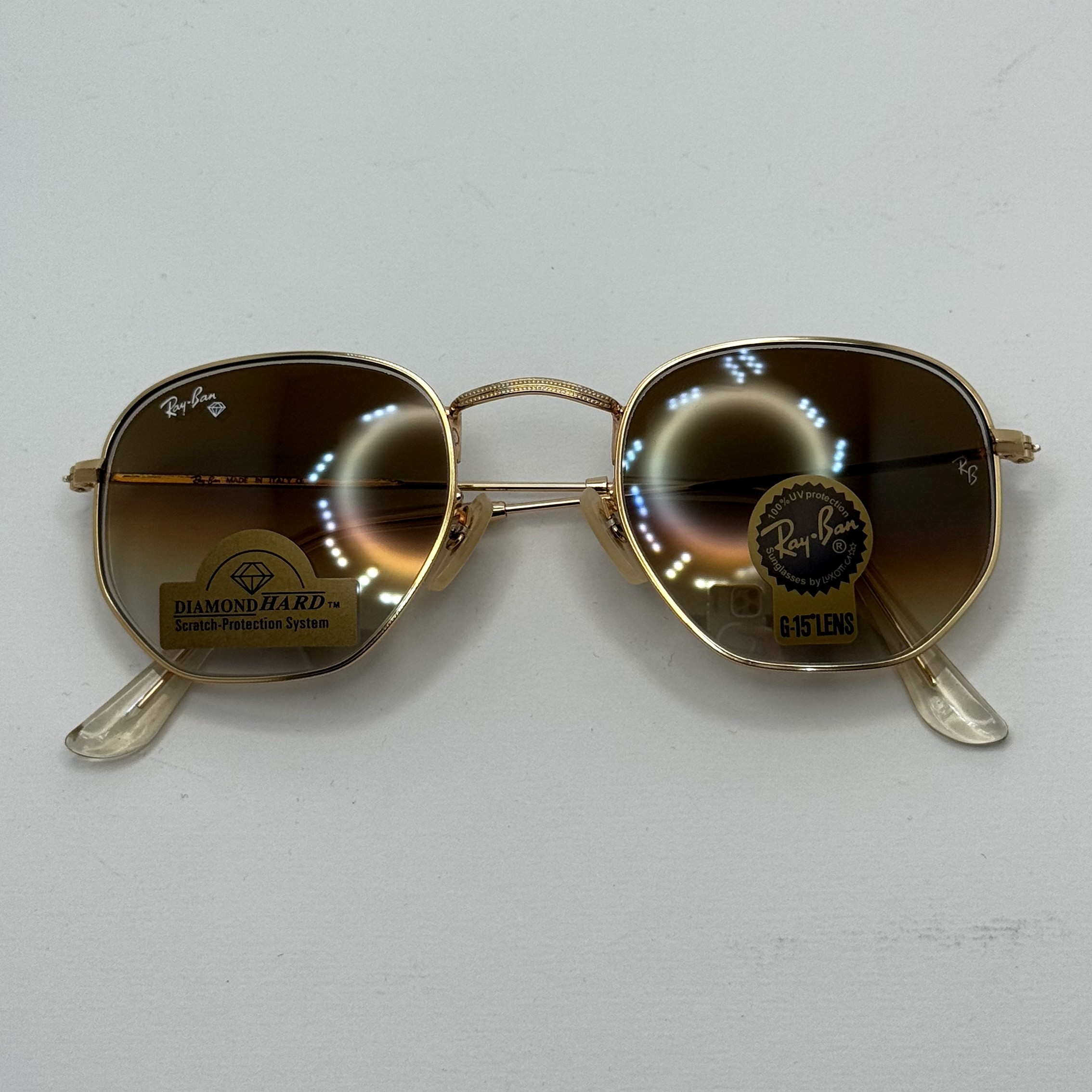 عینک ریبن شیشه سنگ هگزونال قهوه ای هایلایت آنتی رفلکس به همراه پک کامل ریبن کد Rayban RB 3548