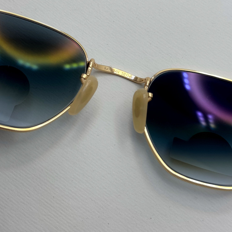 عینک ریبن شیشه سنگ هگزونال آبی هایلایت فریم طلایی آنتی رفلکس به همراه پک کامل ریبن کد Rayban RB 3548