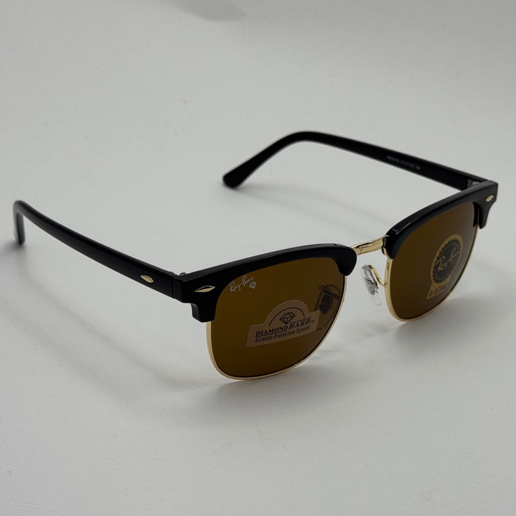 عینک آفتابی ریبن rayban کلاب مستر شیشه سنگ قهوه ای فریم طلایی rb 3016 به همراه پک کامل