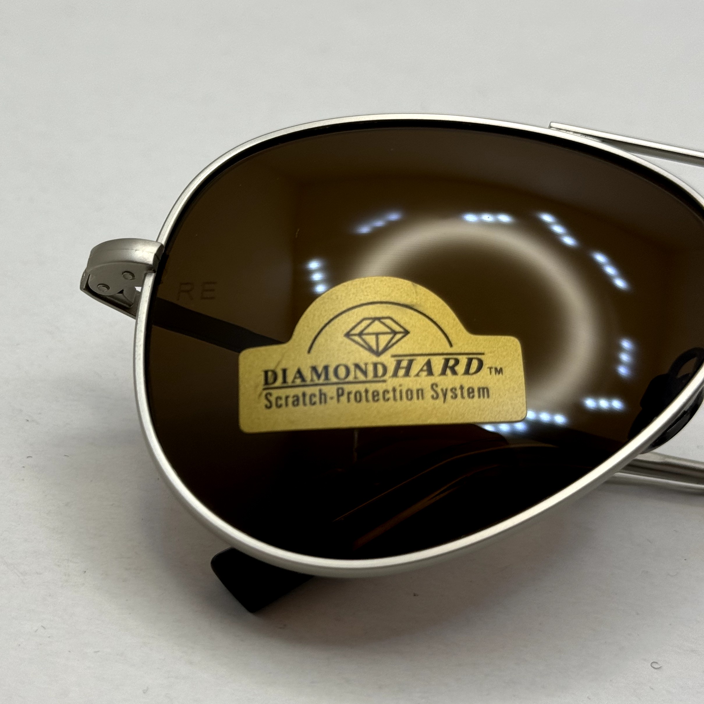 عینک آفتابی خلبانی رندولف شیشه سنگ مدل کانکورد آنتی رفلکس قهوه ای نقره ای فول پک RANDOLPH CONCORD CR 231 24K GOLD