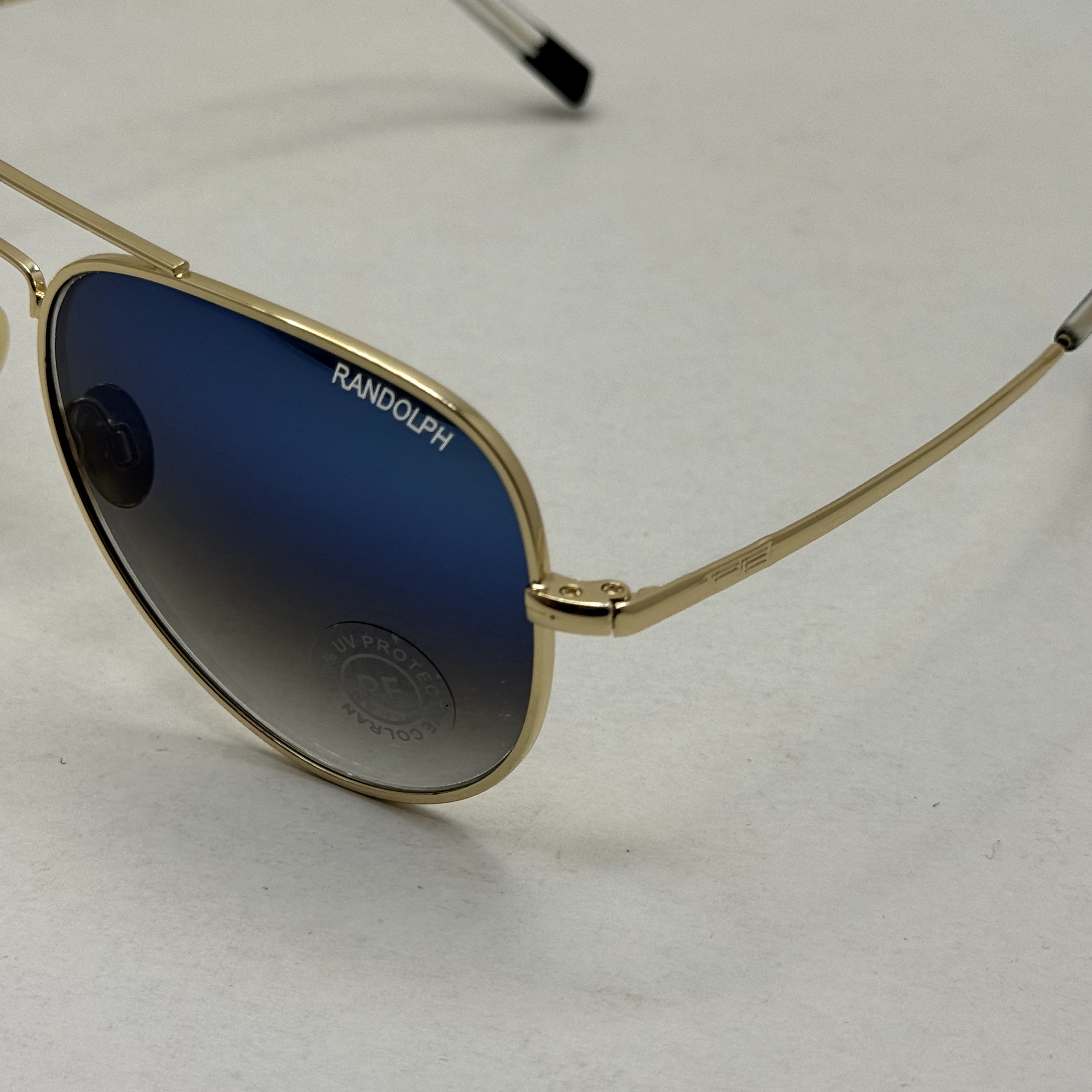 عینک آفتابی و شب خلبانی رندولف شیشه سنگ مدل کانکورد آبی فریم طلایی فول پک RANDOLPH CONCORD CR 231 24K GOLD