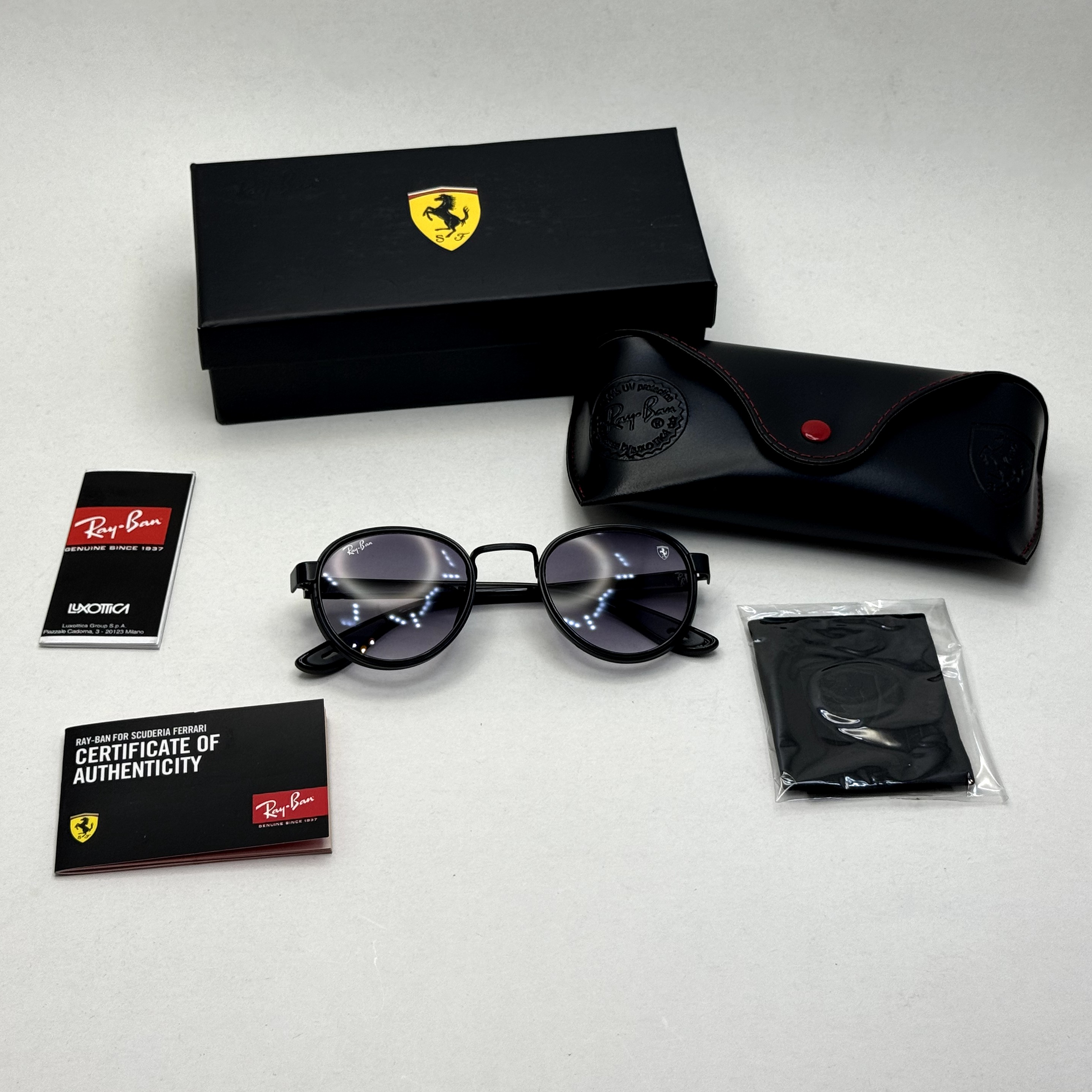 عینک آفتابی گرد ریبن فراری مشکی با پک کاملRayban Ferrari RB3705