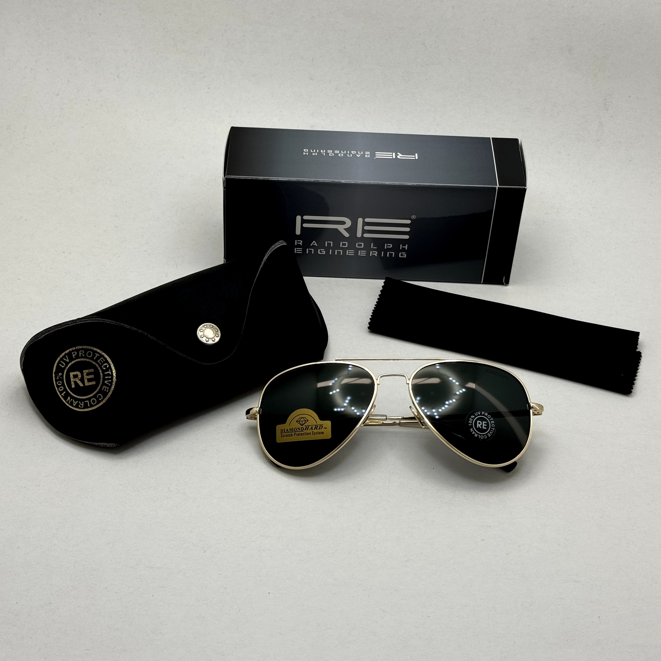 عینک آفتابی خلبانی رندولف شیشه سنگ مدل کانکورد آنتی رفلکس مشکی فریم طلایی فول پک RANDOLPH AVIATOR  CR 231 24K GOLD