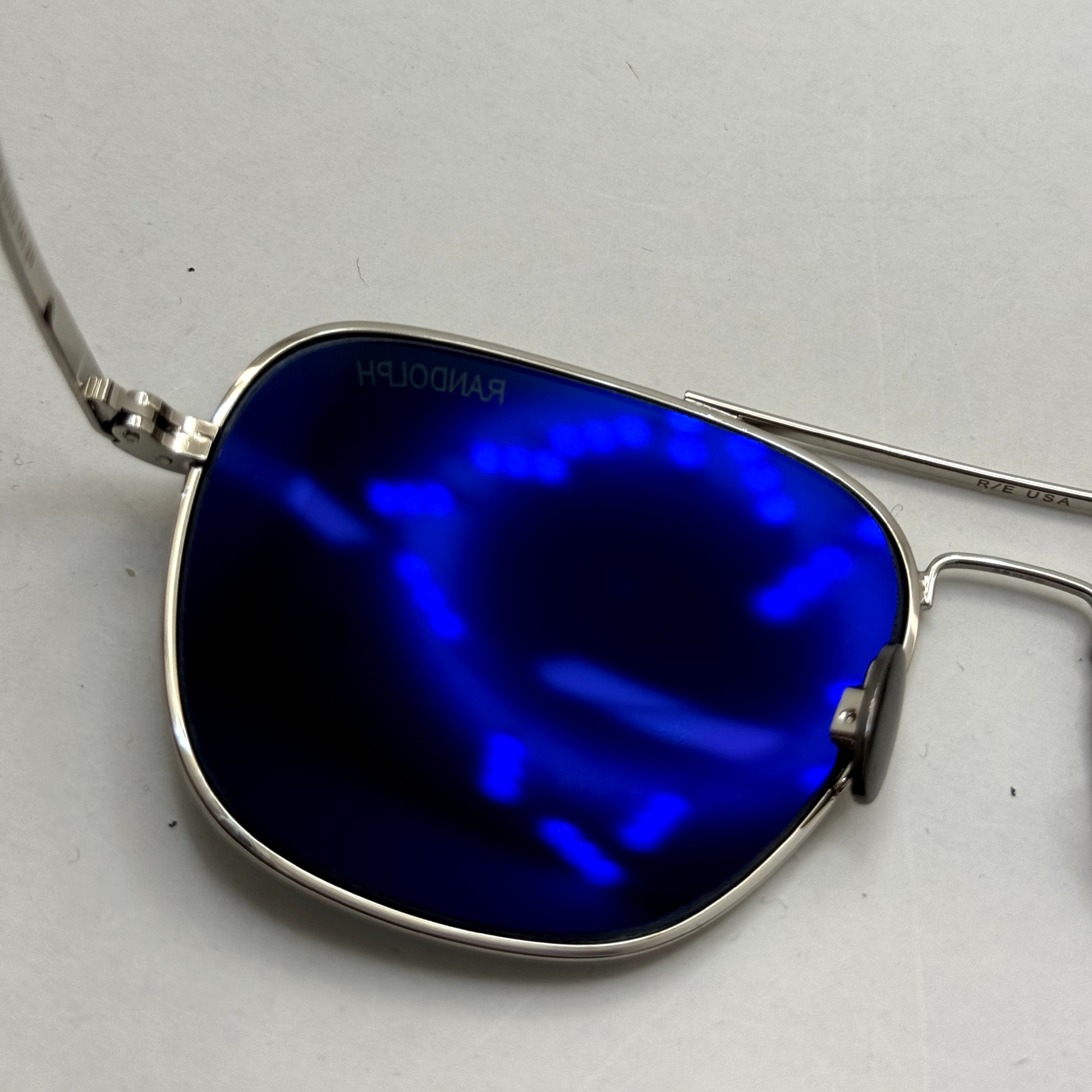 عینک آفتابی خلبانی رندولف شیشه سنگ آنتی رفلکس مشکی فریم نقره ای فول پک RANDOLPH AVIATOR RE 58 WHITE GOLD