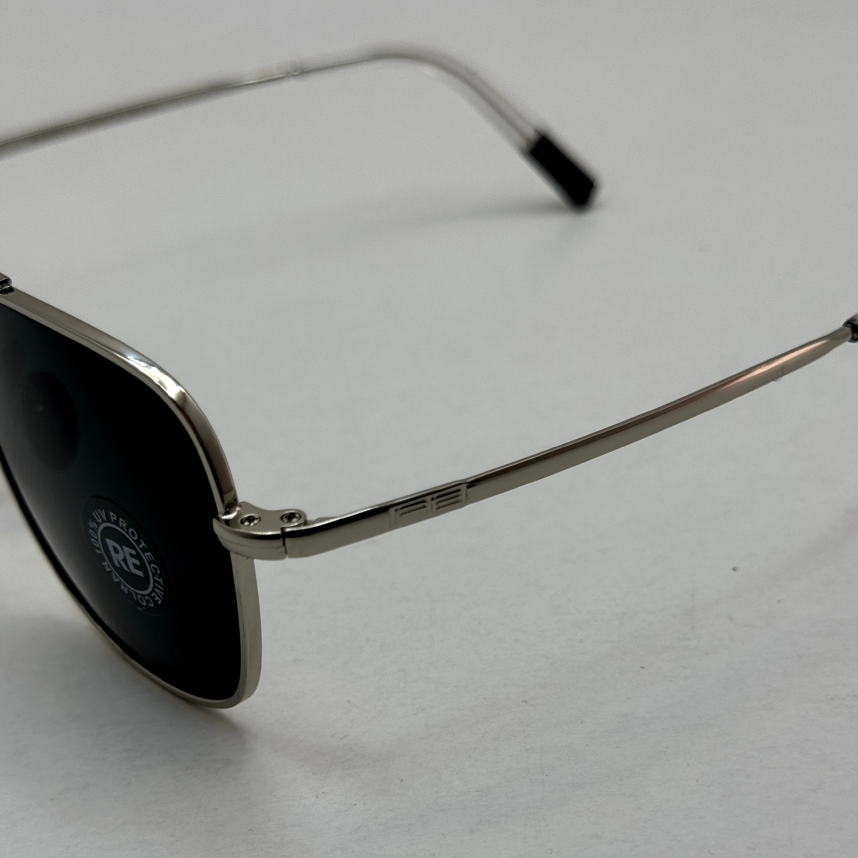 عینک آفتابی خلبانی رندولف شیشه سنگ آنتی رفلکس مشکی فریم نقره ای فول پک RANDOLPH AVIATOR RE 58 WHITE GOLD