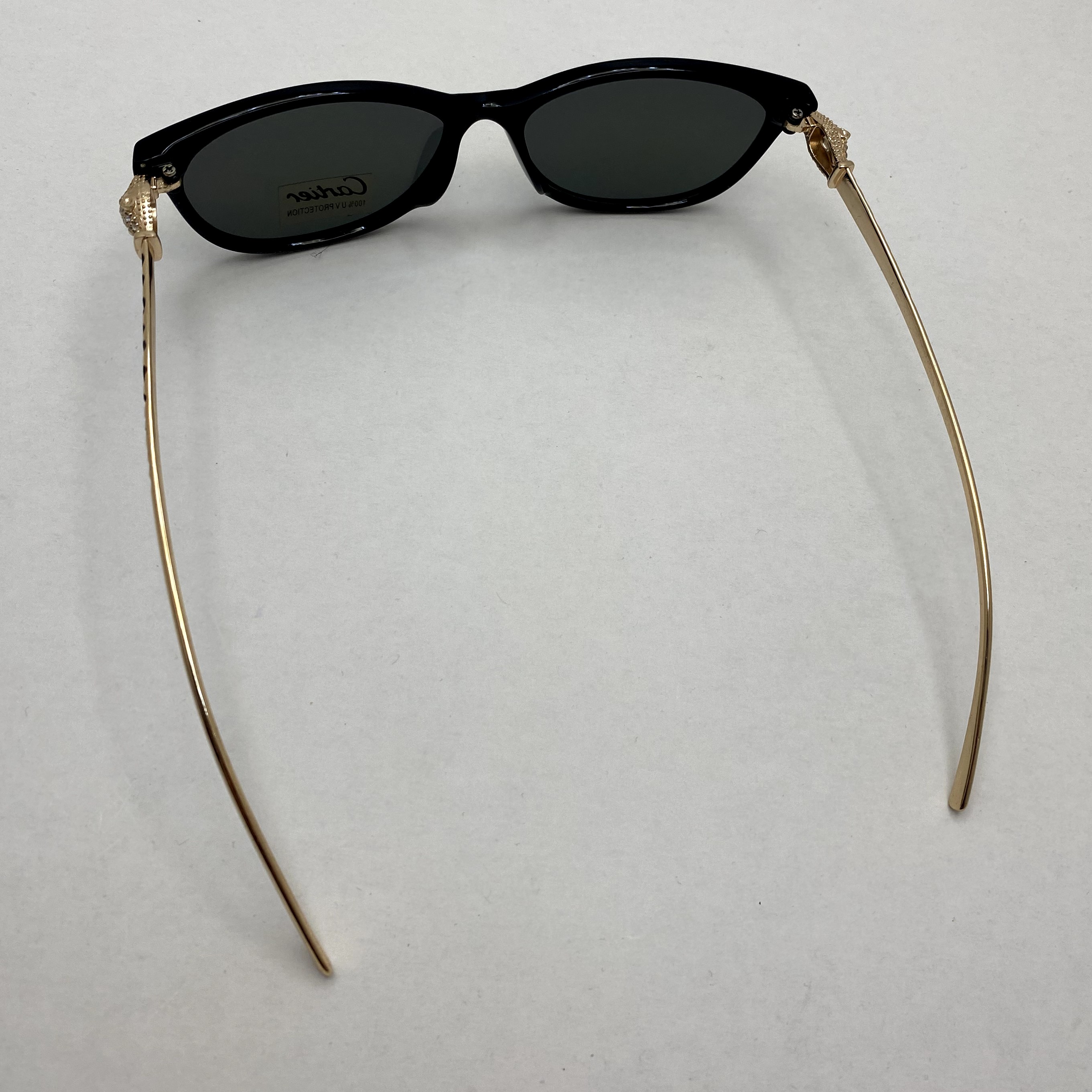 عینک آفتابی زنانه کارتیر Cartier دسته نگین کاری شده فریم مشکی عدسی آتیشی