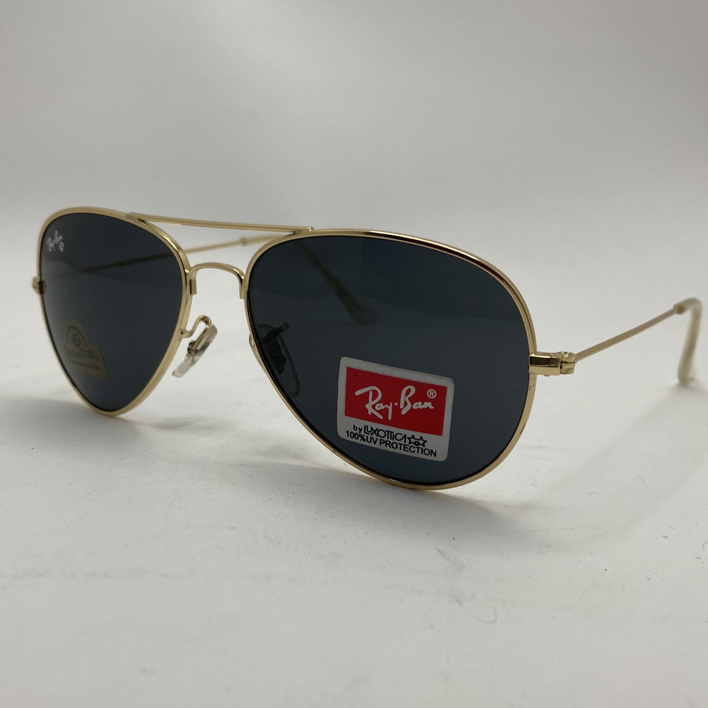 عینک ریبن خلبانی شیشه سنگ مشکی طلایی با پک کامل ریبن rayban aviator rb 3025