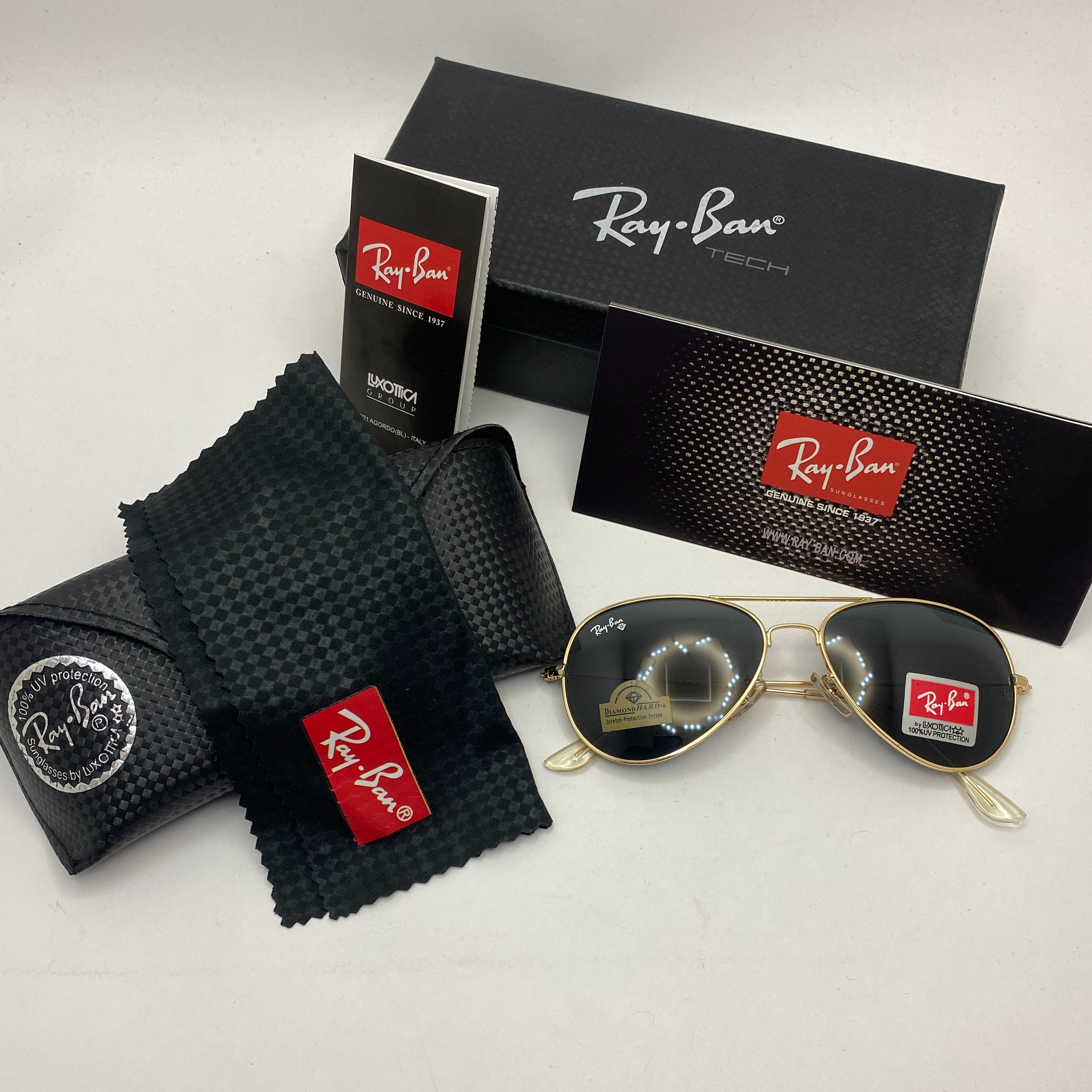 عینک ریبن خلبانی شیشه سنگ مشکی طلایی با پک کامل ریبن rayban aviator rb 3025