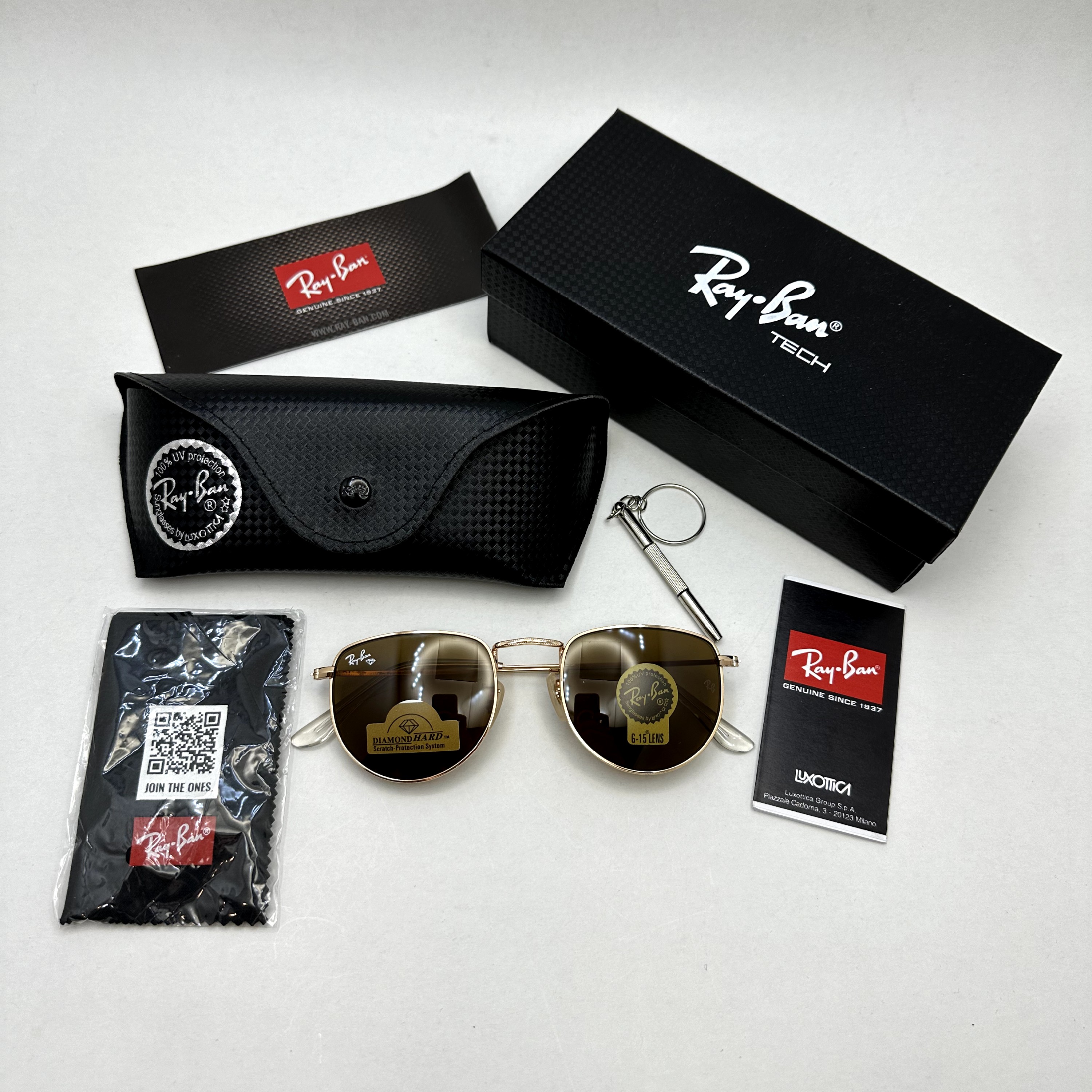 عینک آفتابی ریبن rayban شیشه سنگ قهوه ای طلایی کد rb 3958 - فول پک
