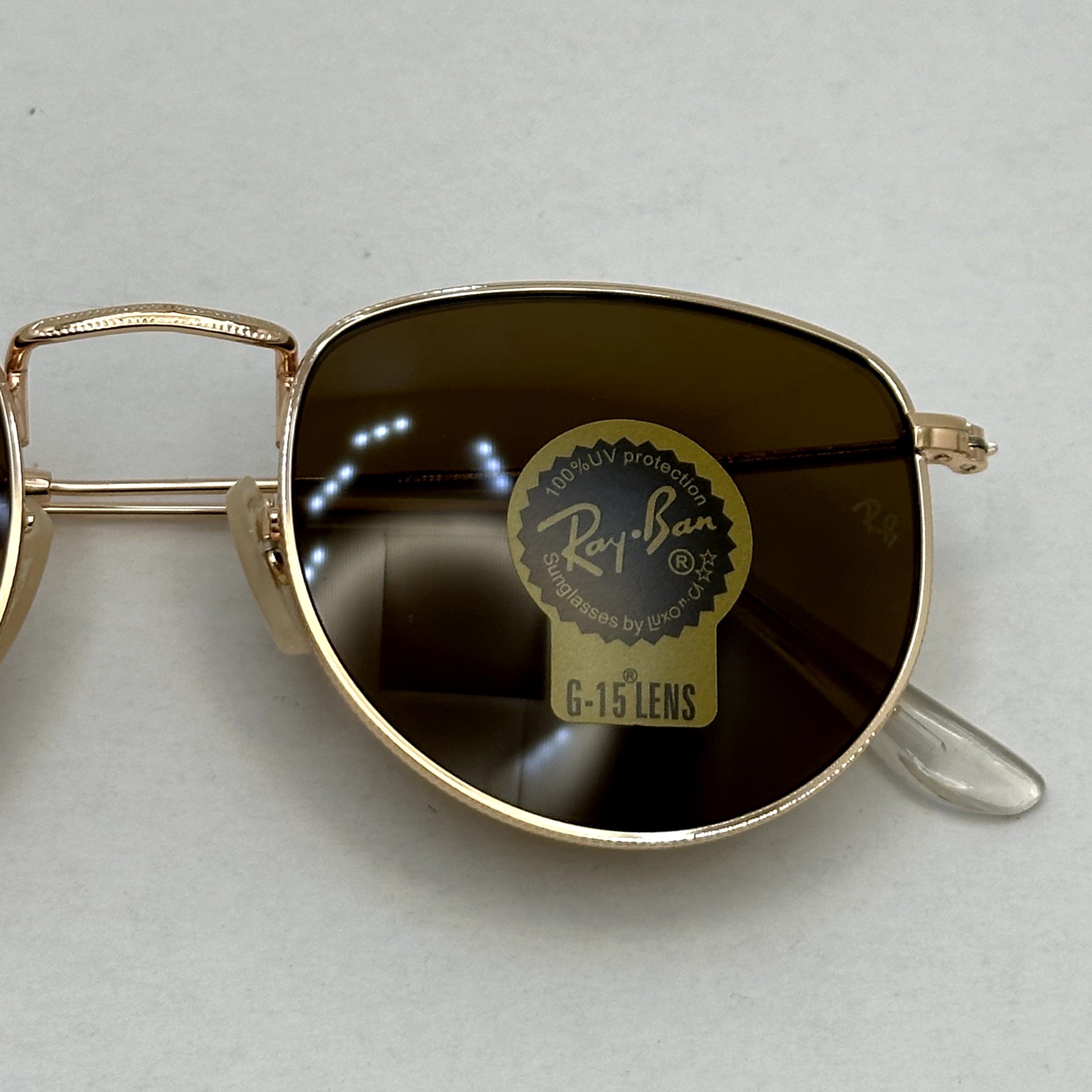 عینک آفتابی ریبن rayban شیشه سنگ قهوه ای طلایی کد rb 3958 - فول پک