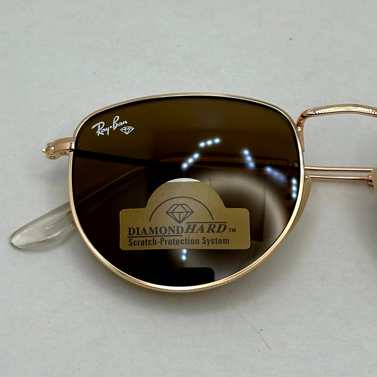 عینک آفتابی ریبن rayban شیشه سنگ قهوه ای طلایی کد rb 3958 - فول پک