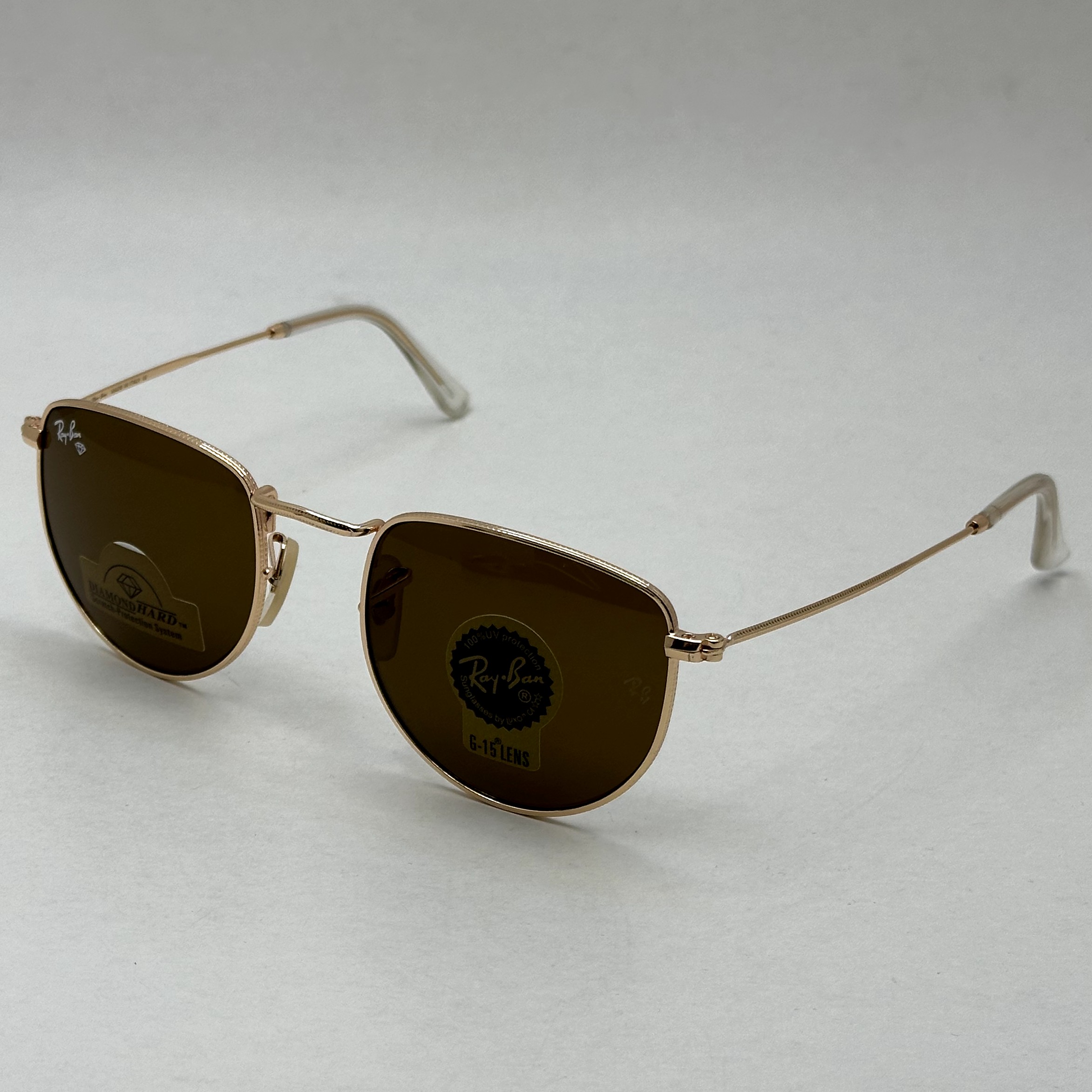 عینک آفتابی ریبن rayban شیشه سنگ قهوه ای طلایی کد rb 3958 - فول پک