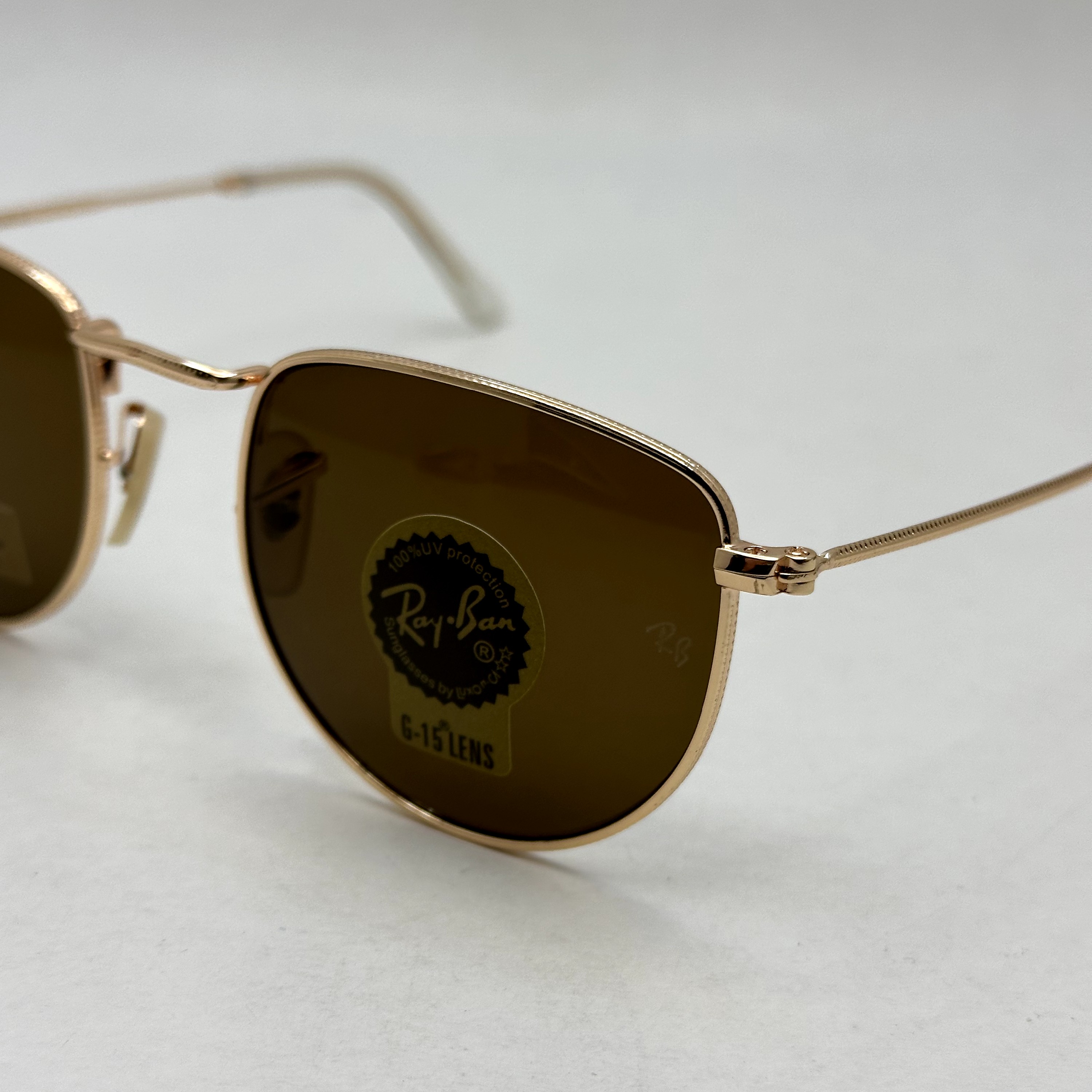 عینک آفتابی ریبن rayban شیشه سنگ قهوه ای طلایی کد rb 3958 - فول پک
