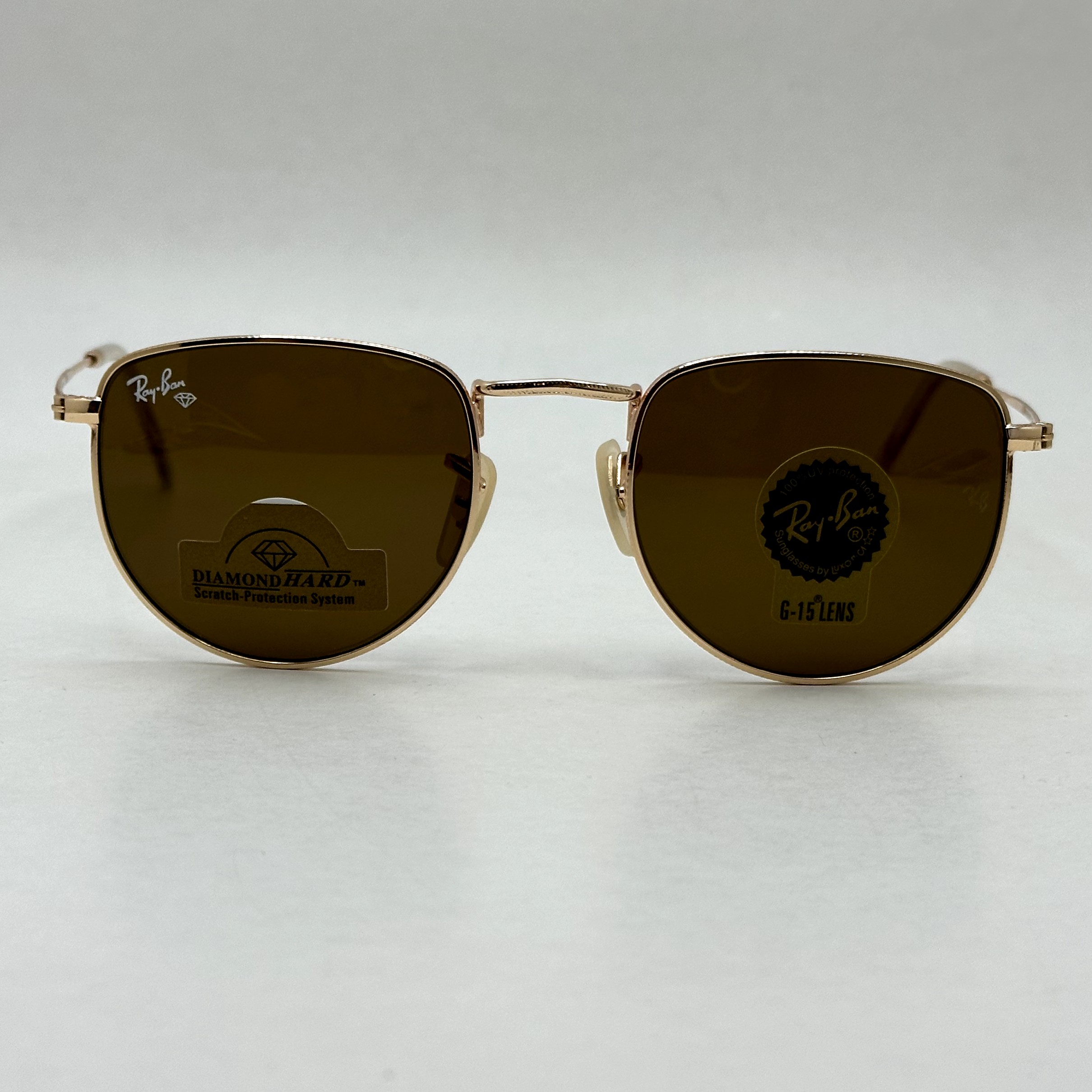 عینک آفتابی ریبن rayban شیشه سنگ قهوه ای طلایی کد rb 3958 - فول پک