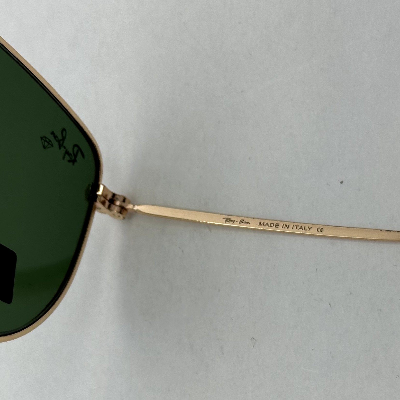 عینک آفتابی ریبن rayban شیشه سنگ سبز طلایی کد rb 3958 - فول پک