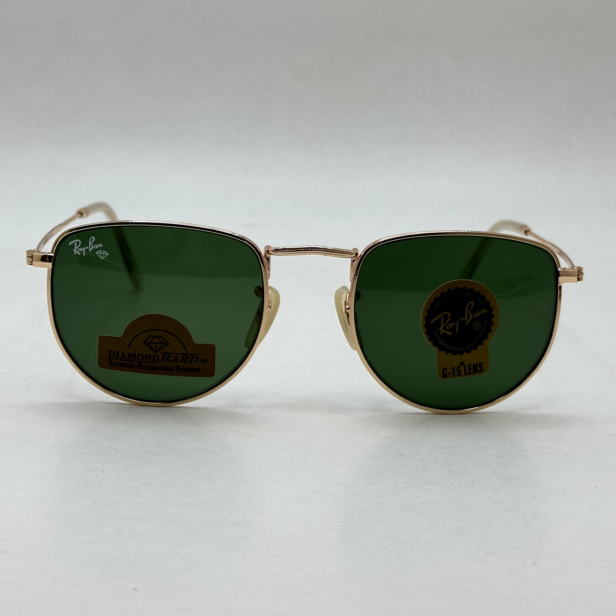 عینک آفتابی ریبن rayban شیشه سنگ سبز طلایی کد rb 3958 - فول پک