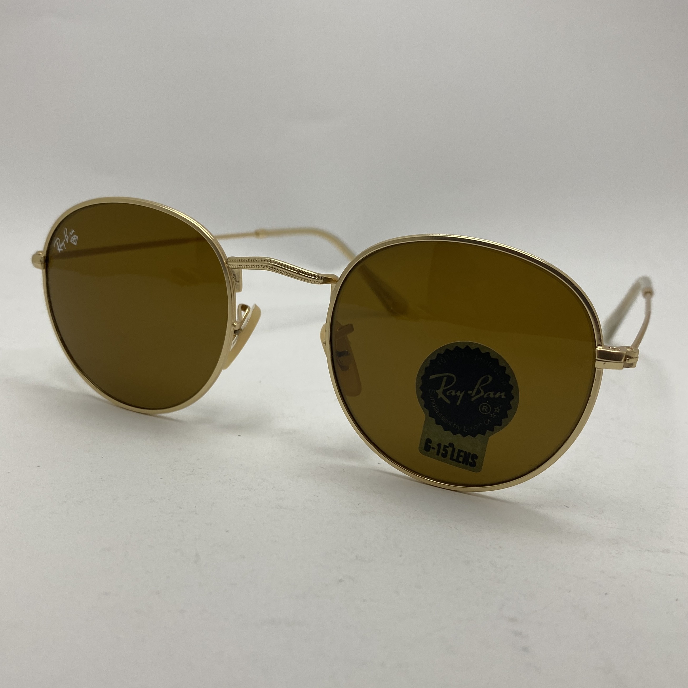 عینک آفتابی ریبن rayban گرد قهوه ای طلایی RB 3447